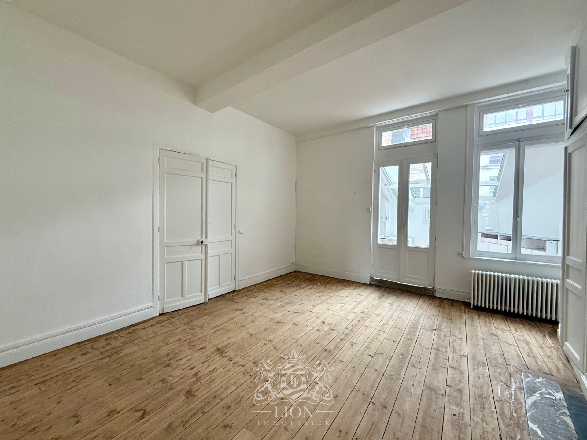 Uxr vieux lille t2 bis place du lion d or Photo 2 - Le Lion Immobilier