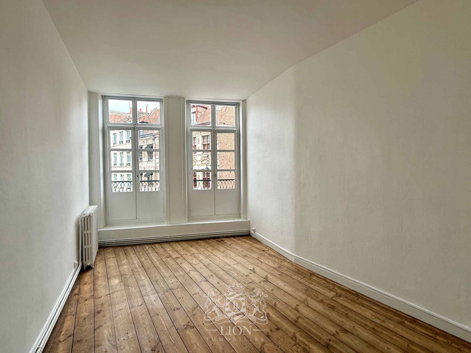 Uxr vieux lille t2 bis place du lion d or Photo 6 - Le Lion Immobilier
