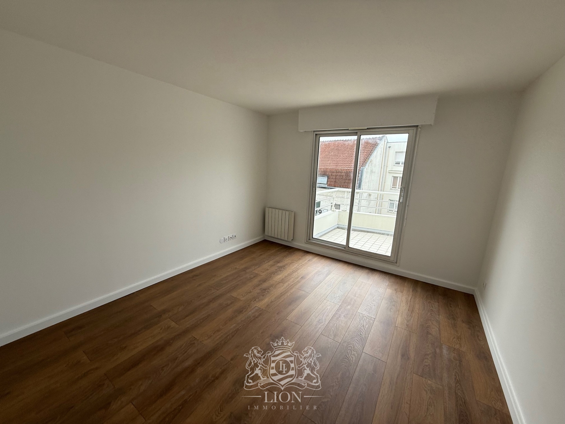 Ypw vieux lille type 4 avec terrasse et garage Photo 12 - Le Lion Immobilier