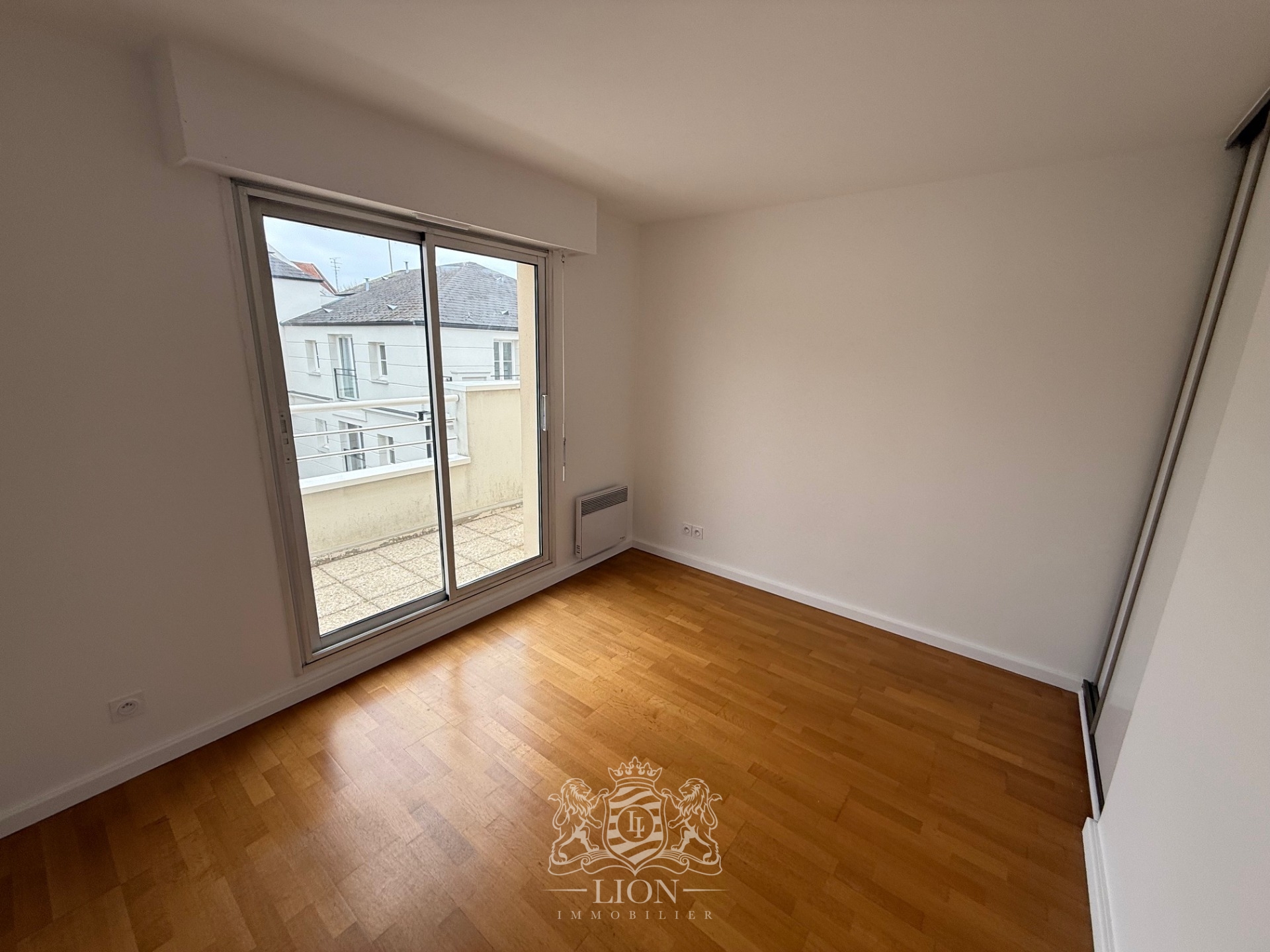 Ypw vieux lille type 4 avec terrasse et garage Photo 14 - Le Lion Immobilier