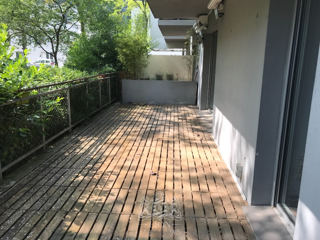 Appartement avec terrasse et jardin Photo 1 - Le Lion Immobilier