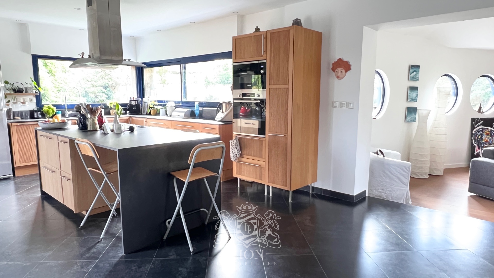 Maison individuelle semi plain pied escavee avec hangar Photo 6 - Le Lion Immobilier