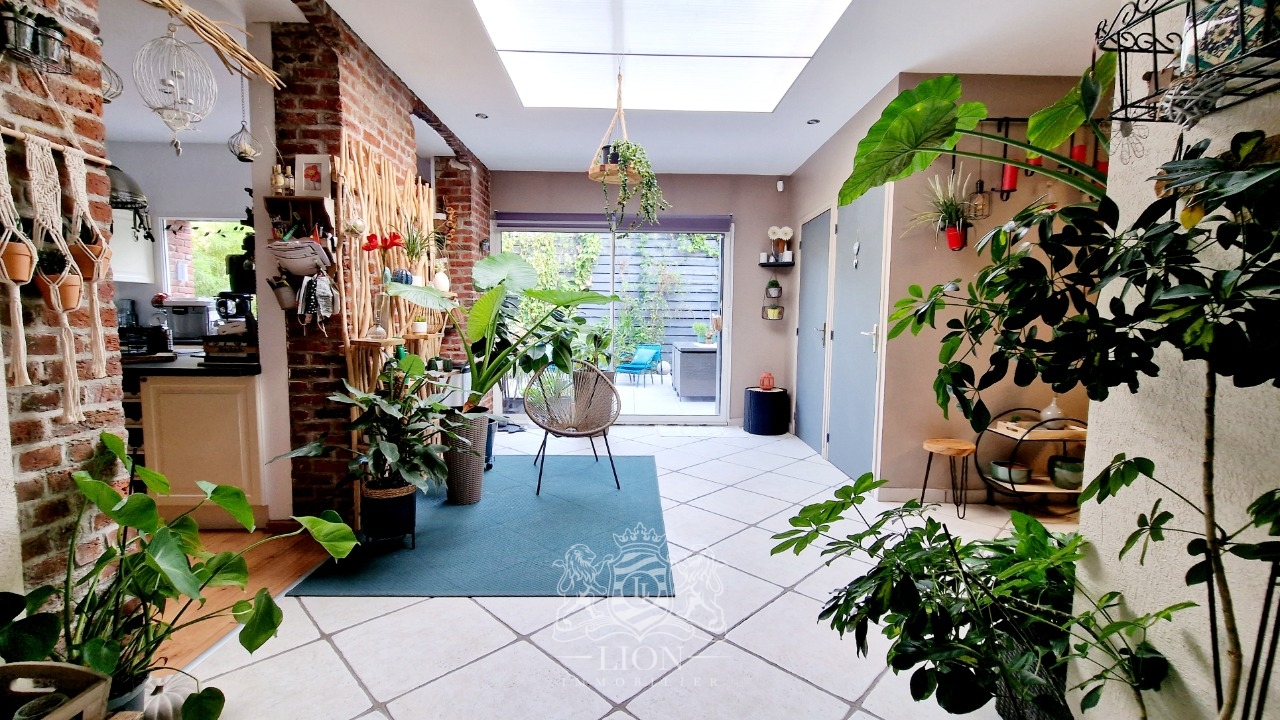 Grande maison avec garage  proximite du metro Photo 1 - Le Lion Immobilier