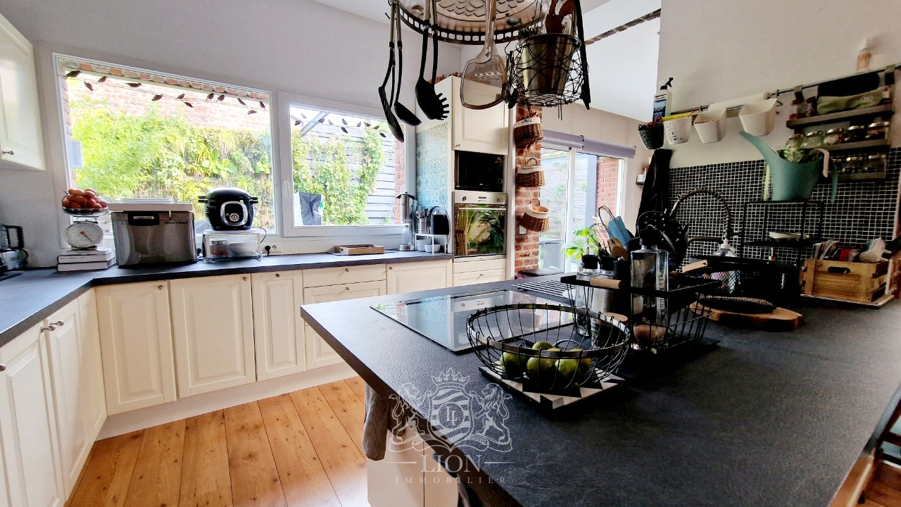 Grande maison avec garage  proximite du metro Photo 3 - Le Lion Immobilier