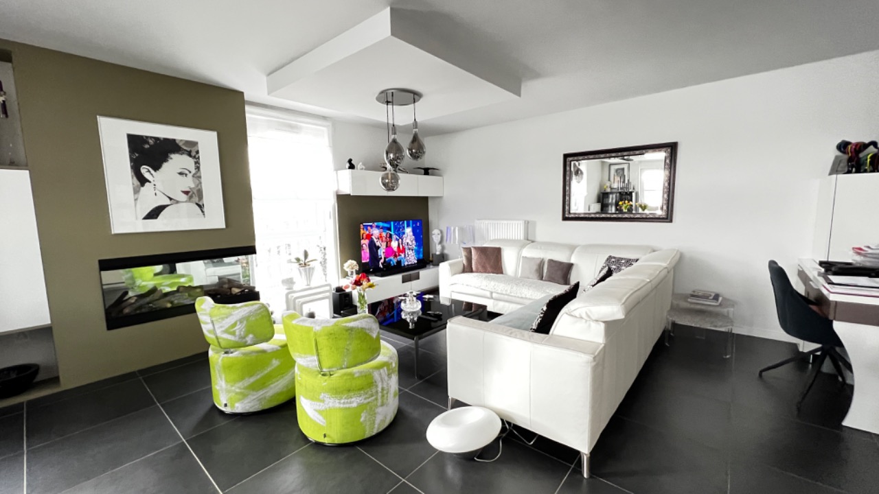 Appartement t3 avec terrasses et garage - Le Lion Immobilier