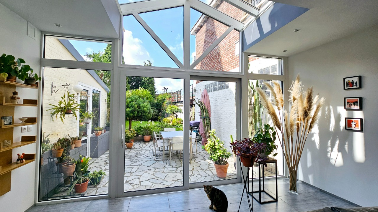 Maison semi individuelle 4 chambres deux garages et atelier Photo 5 - Le Lion Immobilier