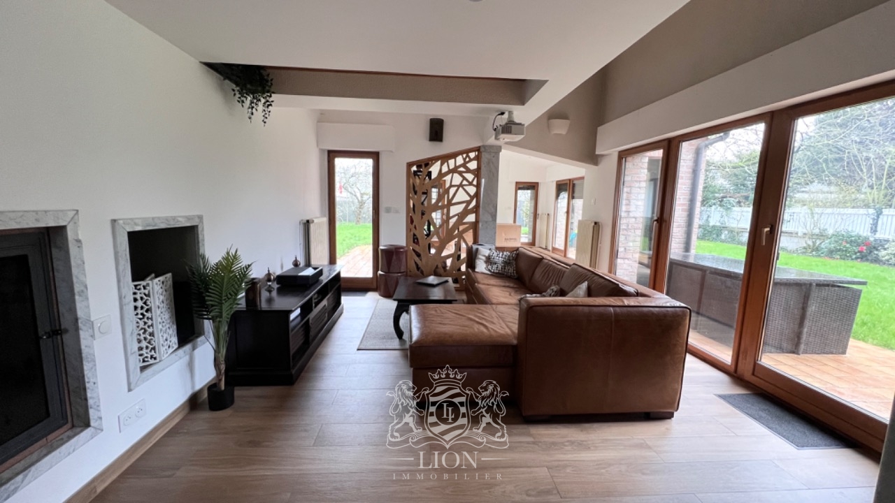 Maison individuelle d architecte semi plain pied Photo 1 - Le Lion Immobilier