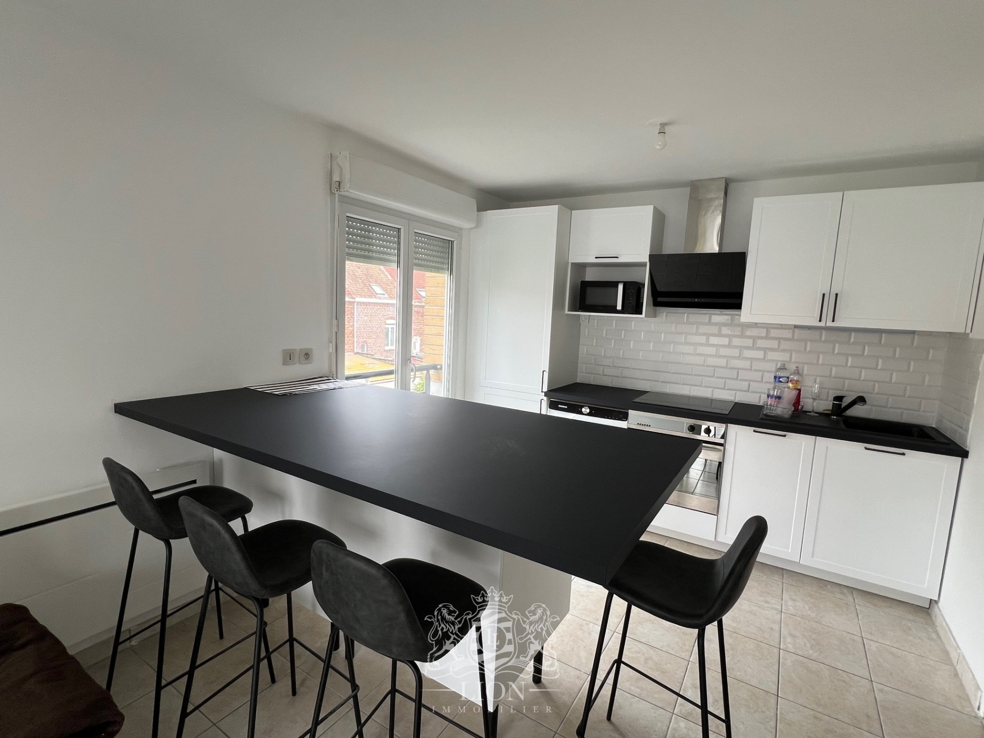 Saint andre lez lille t3 meuble avec parking piscine Photo 2 - Le Lion Immobilier