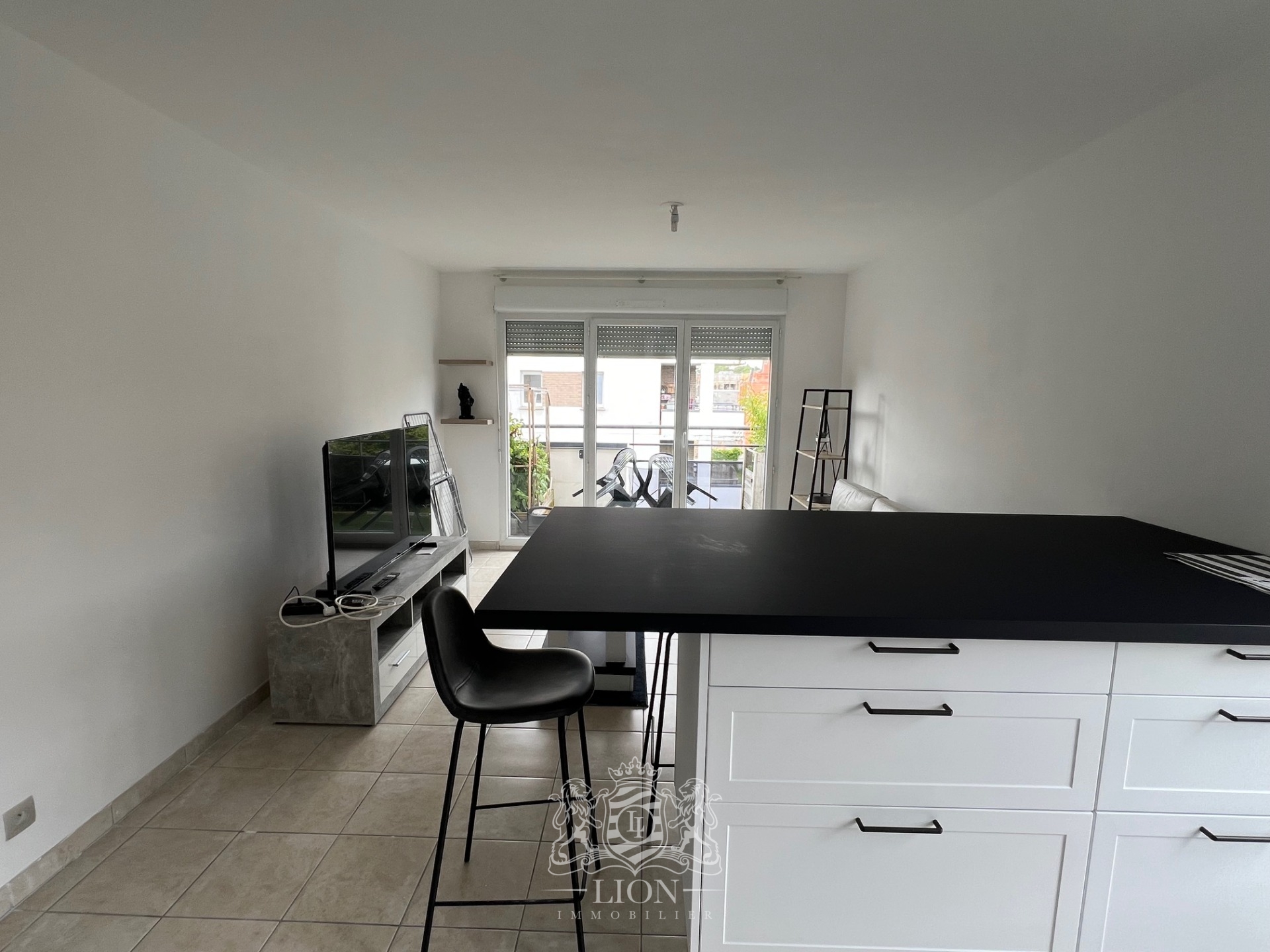 Saint andre lez lille t3 meuble avec parking piscine Photo 3 - Le Lion Immobilier