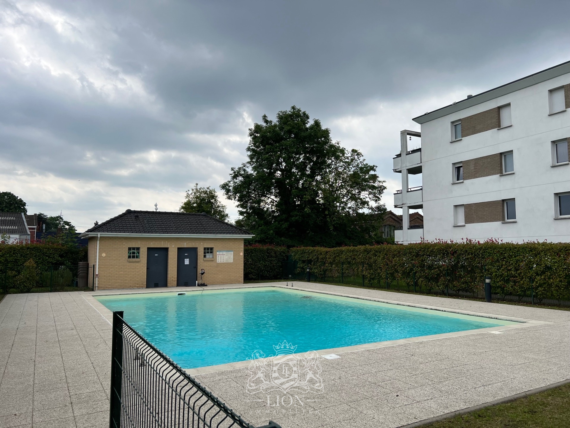 Saint andre lez lille t3 meuble avec parking piscine Photo 8 - Le Lion Immobilier