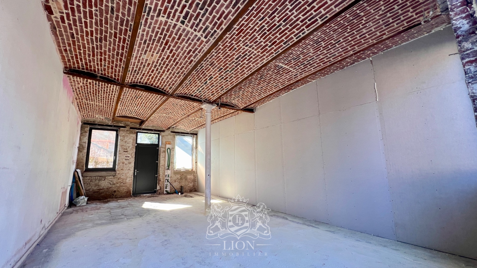 Local commercial 47 m avec parking Photo 1 - Le Lion Immobilier