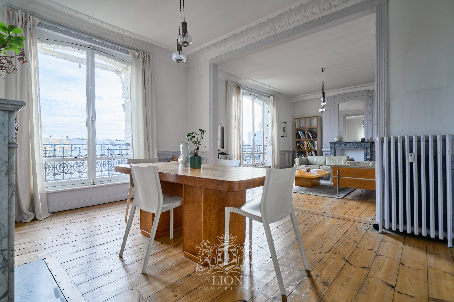 Appartement haussmannien dernier etage parking possible  Photo 1 - Le Lion Immobilier