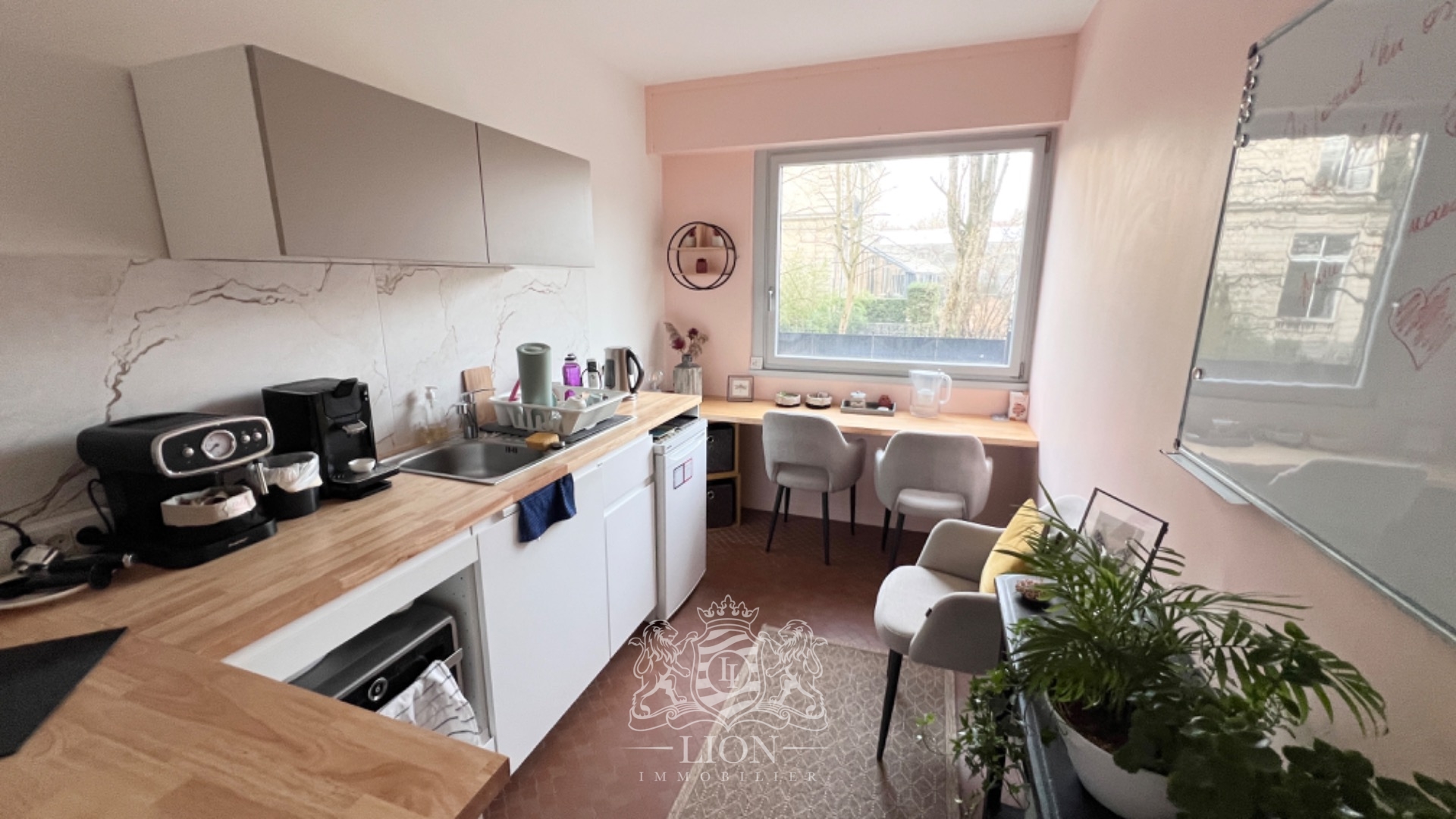 Appartement 2 chambres face au parc barbieux et garage Photo 6 - Le Lion Immobilier