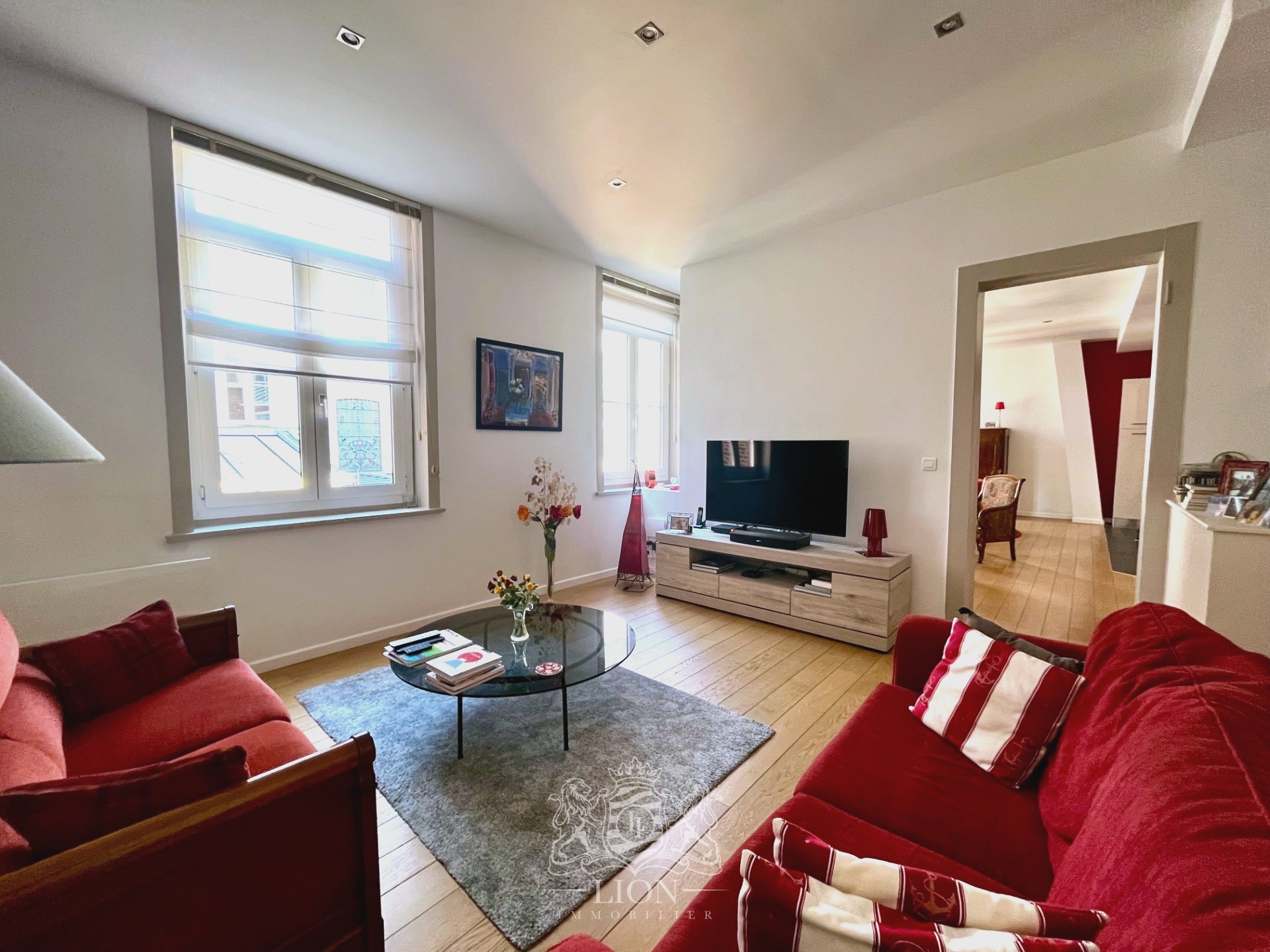 Triplex de 146 m en fond de cour Photo 2 - Le Lion Immobilier