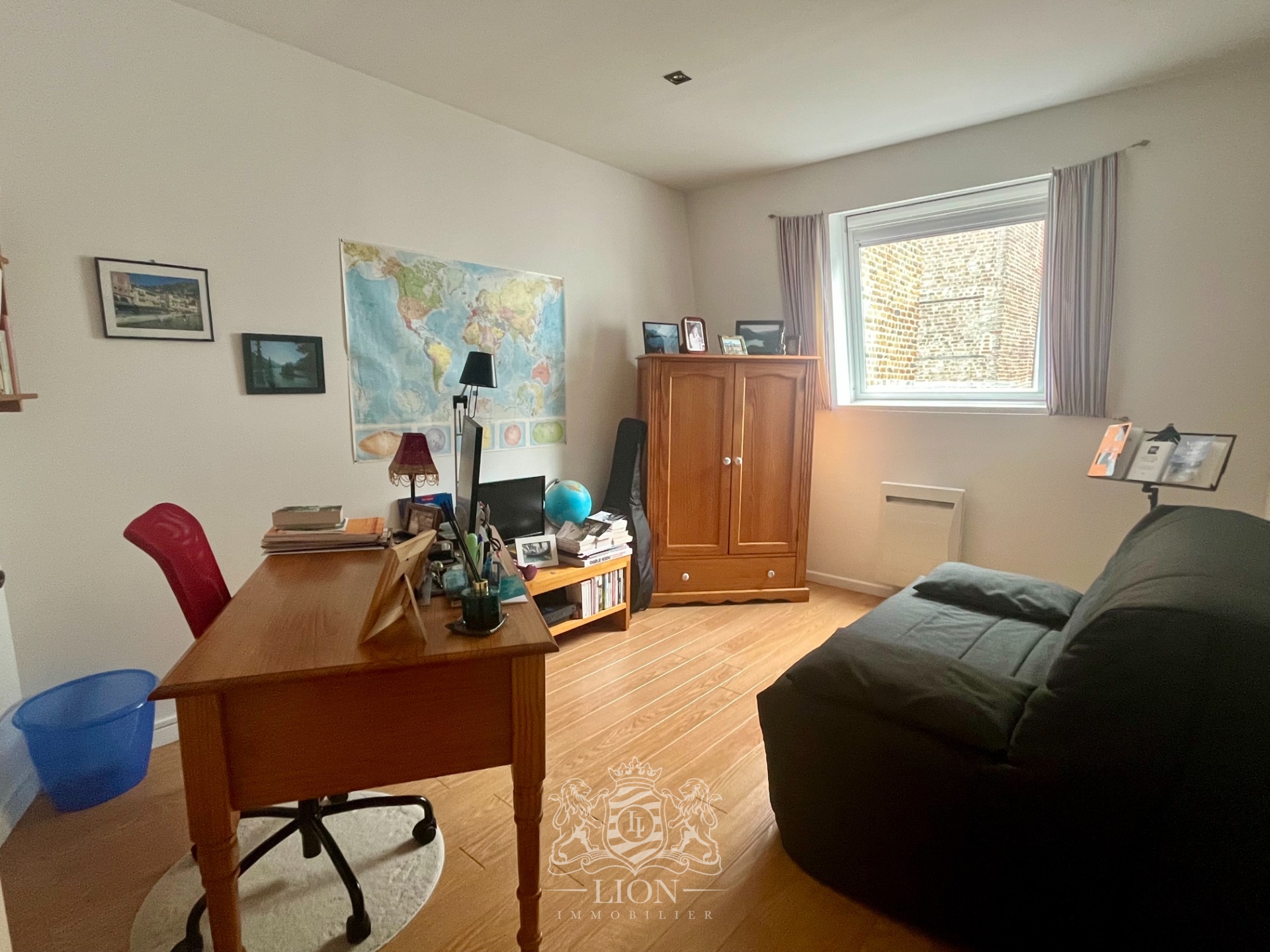 Triplex de 146 m en fond de cour Photo 5 - Le Lion Immobilier