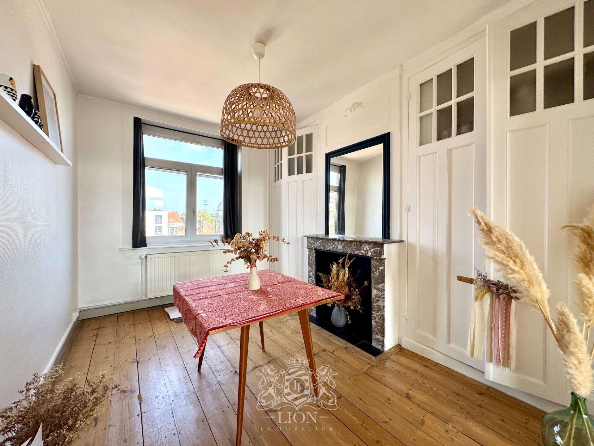 Appartement de charme avec cachet emplacement exceptionnel Photo 3 - Le Lion Immobilier