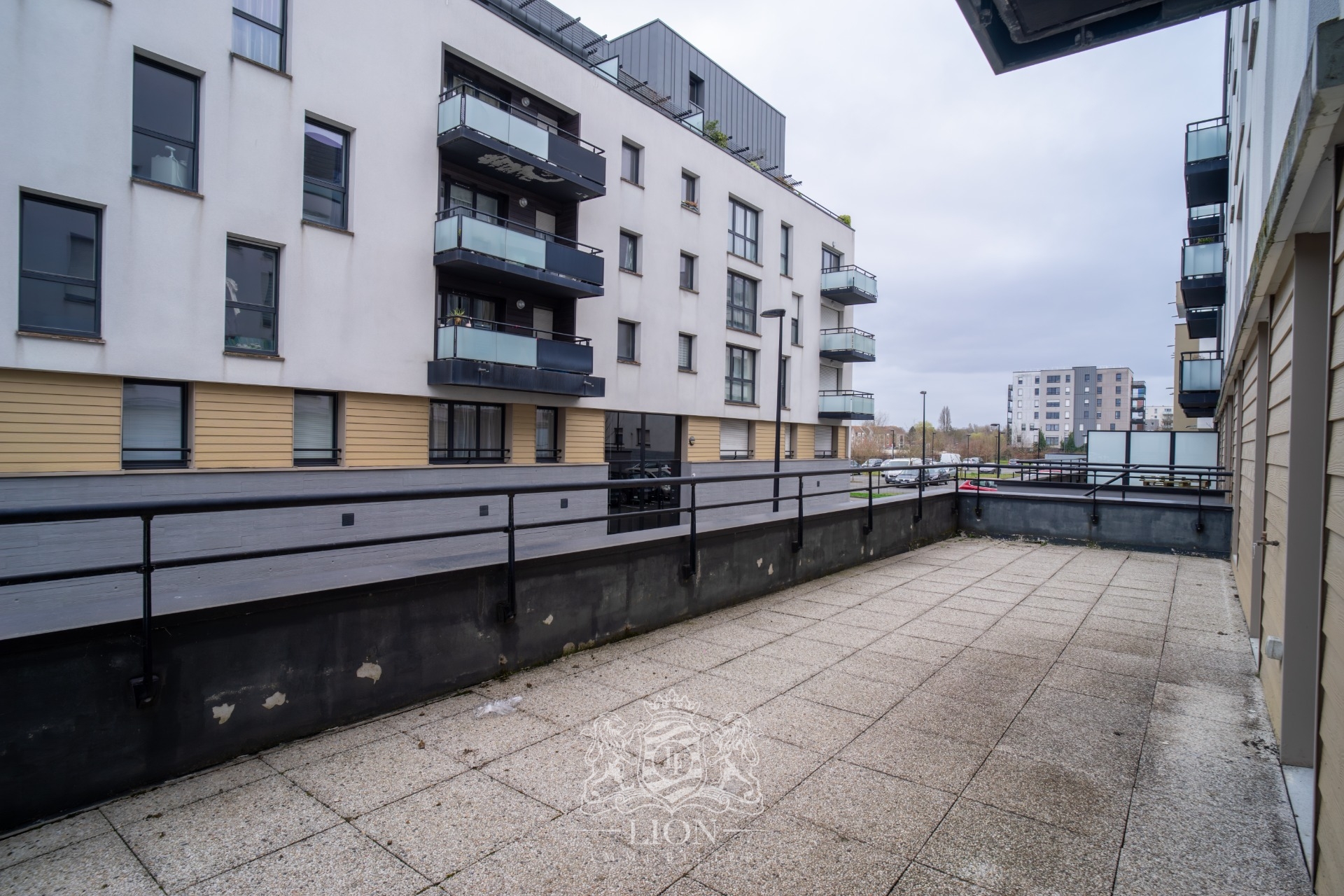 Bel appartement deux chambres terrasse et garage  Photo 1 - Le Lion Immobilier