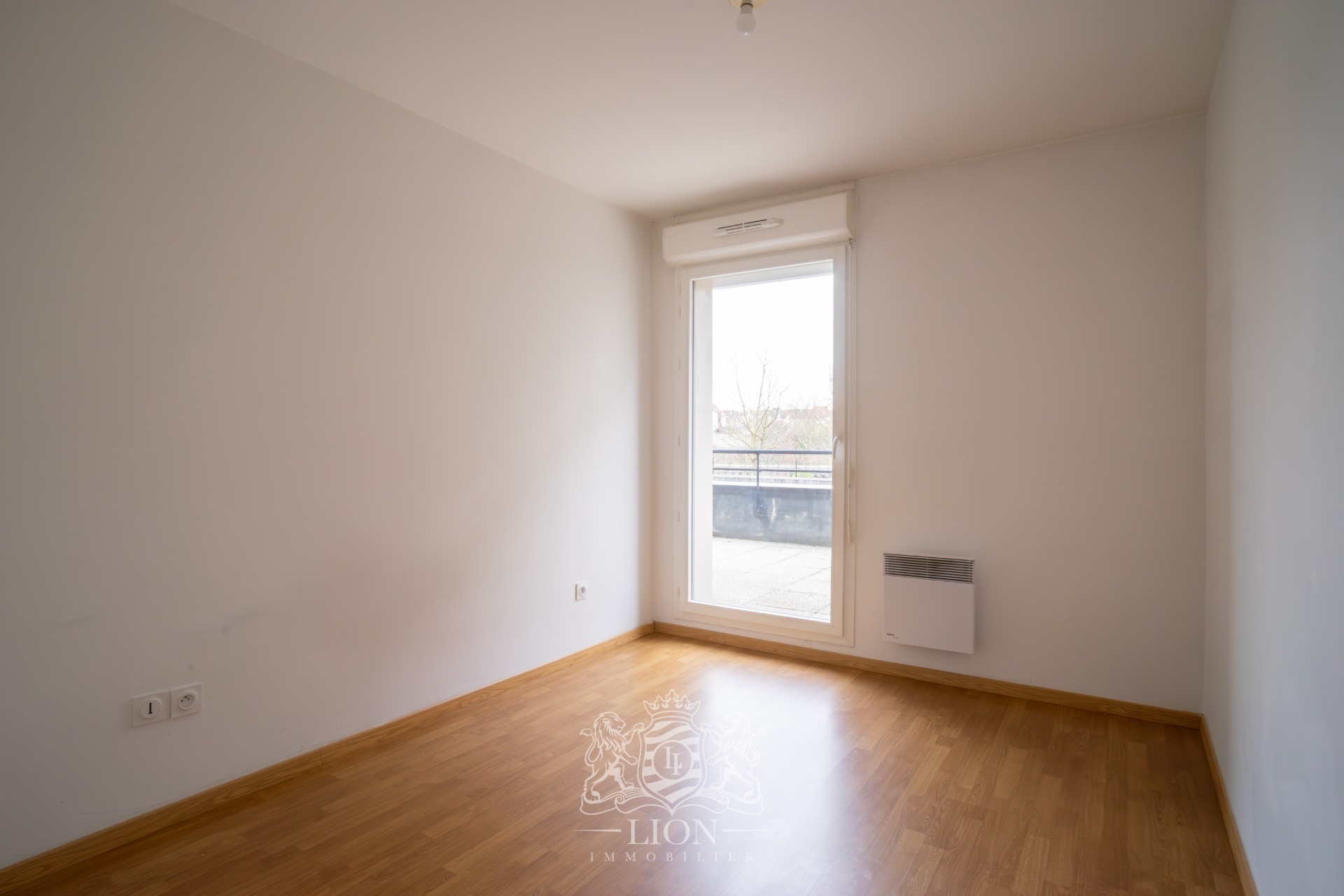 Bel appartement deux chambres terrasse et garage  Photo 5 - Le Lion Immobilier