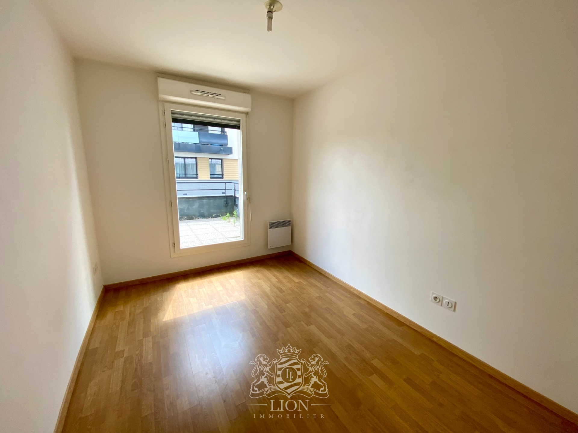 Bel appartement deux chambres terrasse et garage  Photo 6 - Le Lion Immobilier