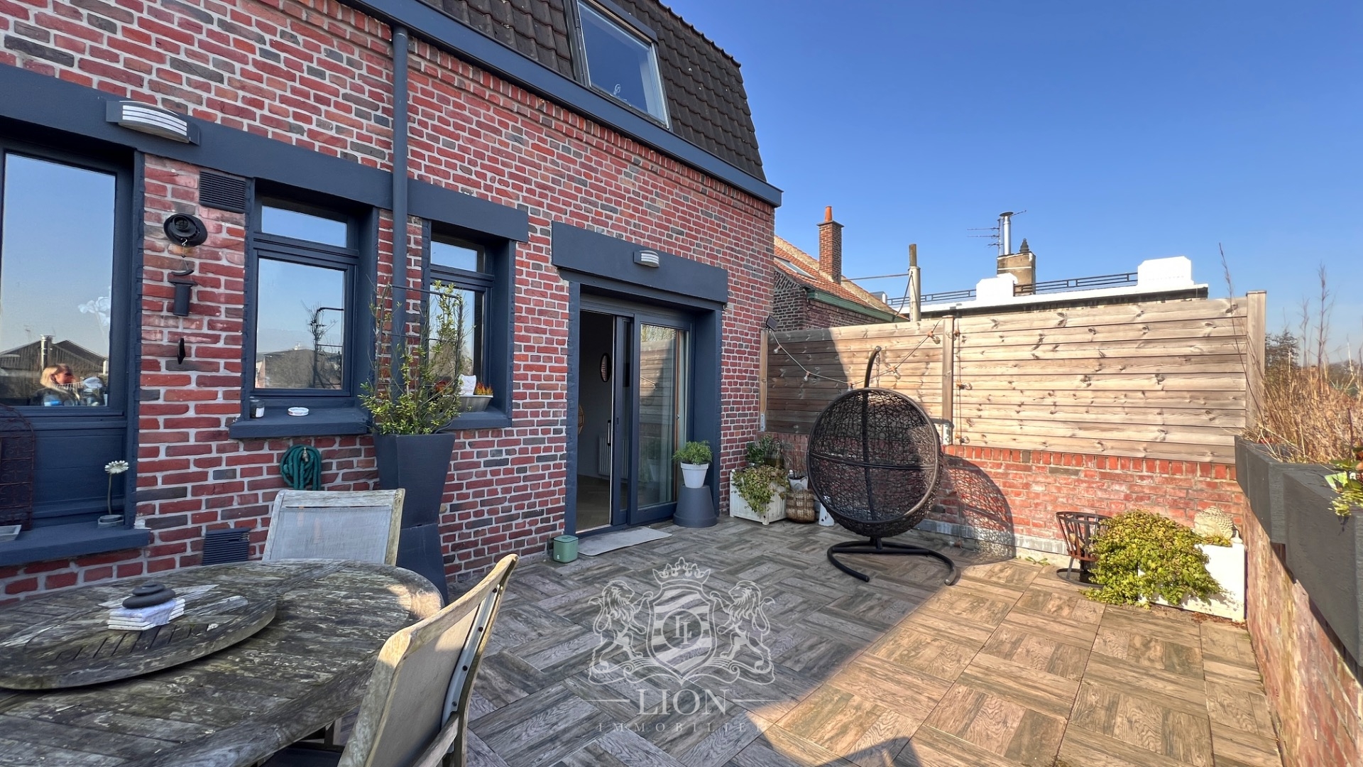 Maison appartement avec terrasse Photo 1 - Le Lion Immobilier