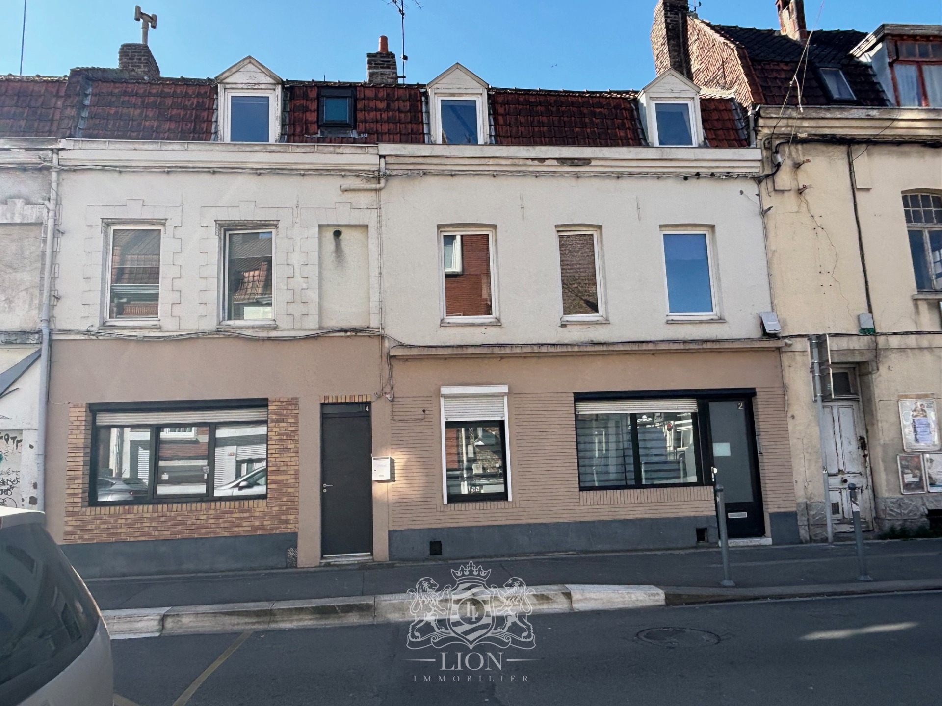 Lille fives petit immeuble de 4 logements Photo 1 - Le Lion Immobilier