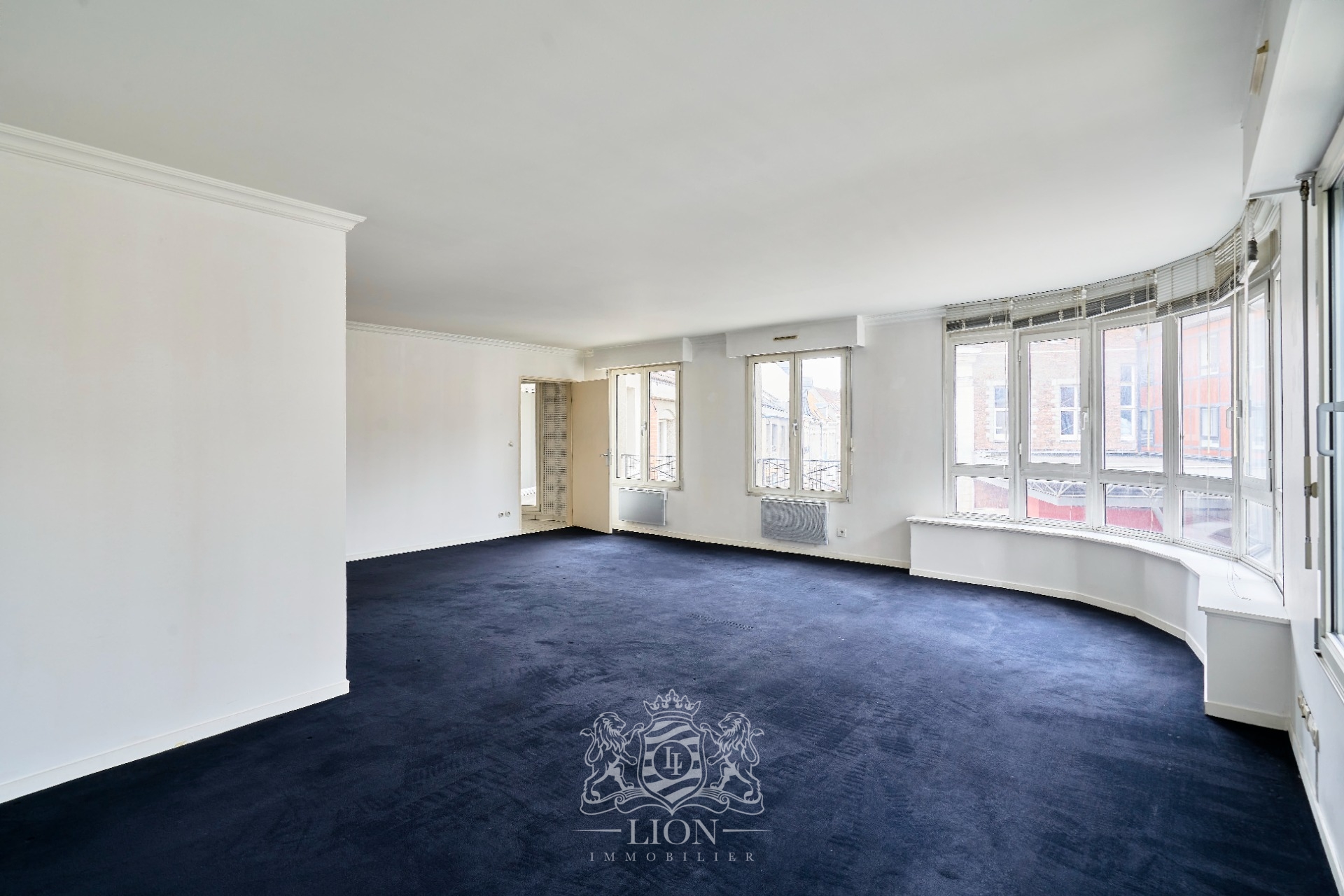 T4 proche place du lion d or parking exterieur Photo 2 - Le Lion Immobilier