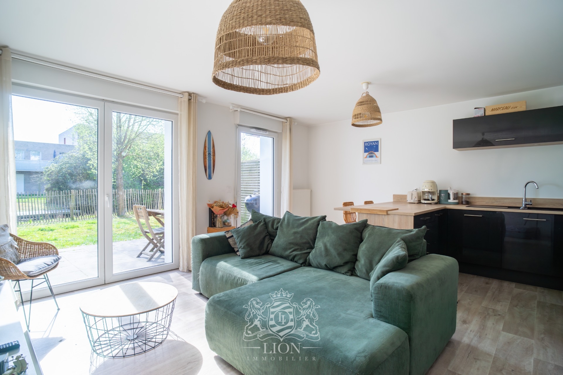 Appartement en rez de jardin Photo 1 - Le Lion Immobilier