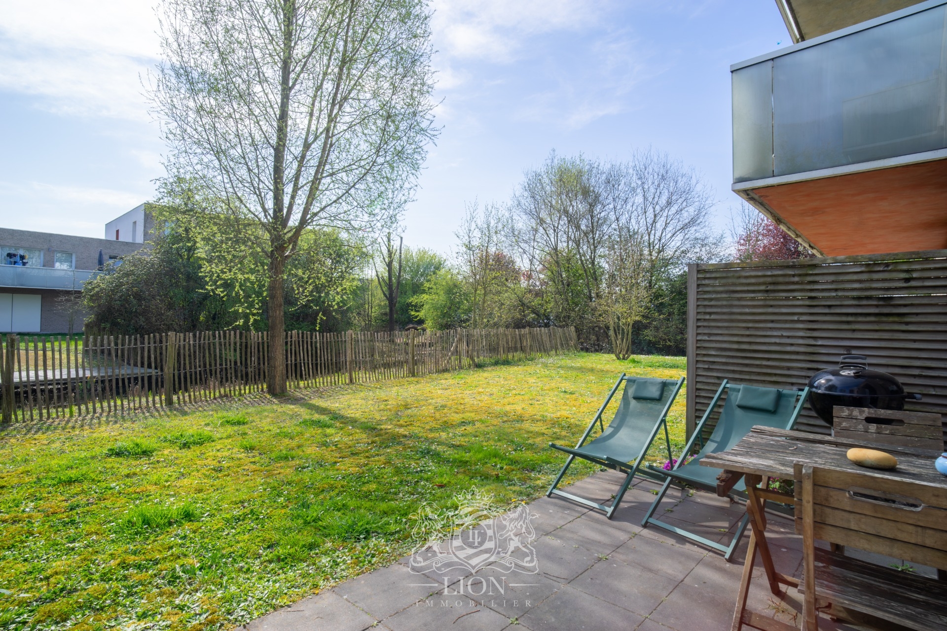 Appartement en rez de jardin Photo 3 - Le Lion Immobilier