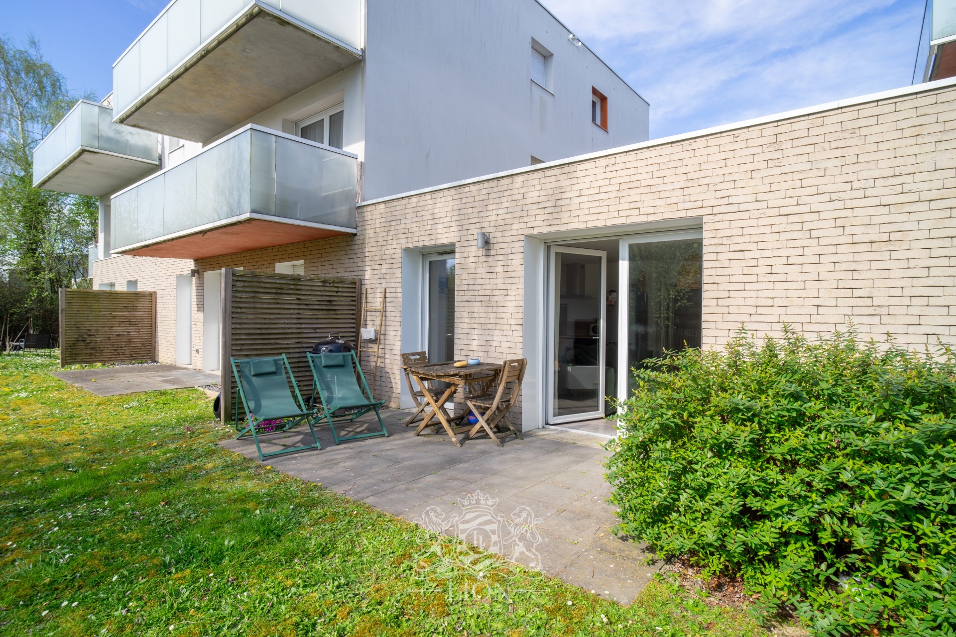 Appartement en rez de jardin Photo 4 - Le Lion Immobilier