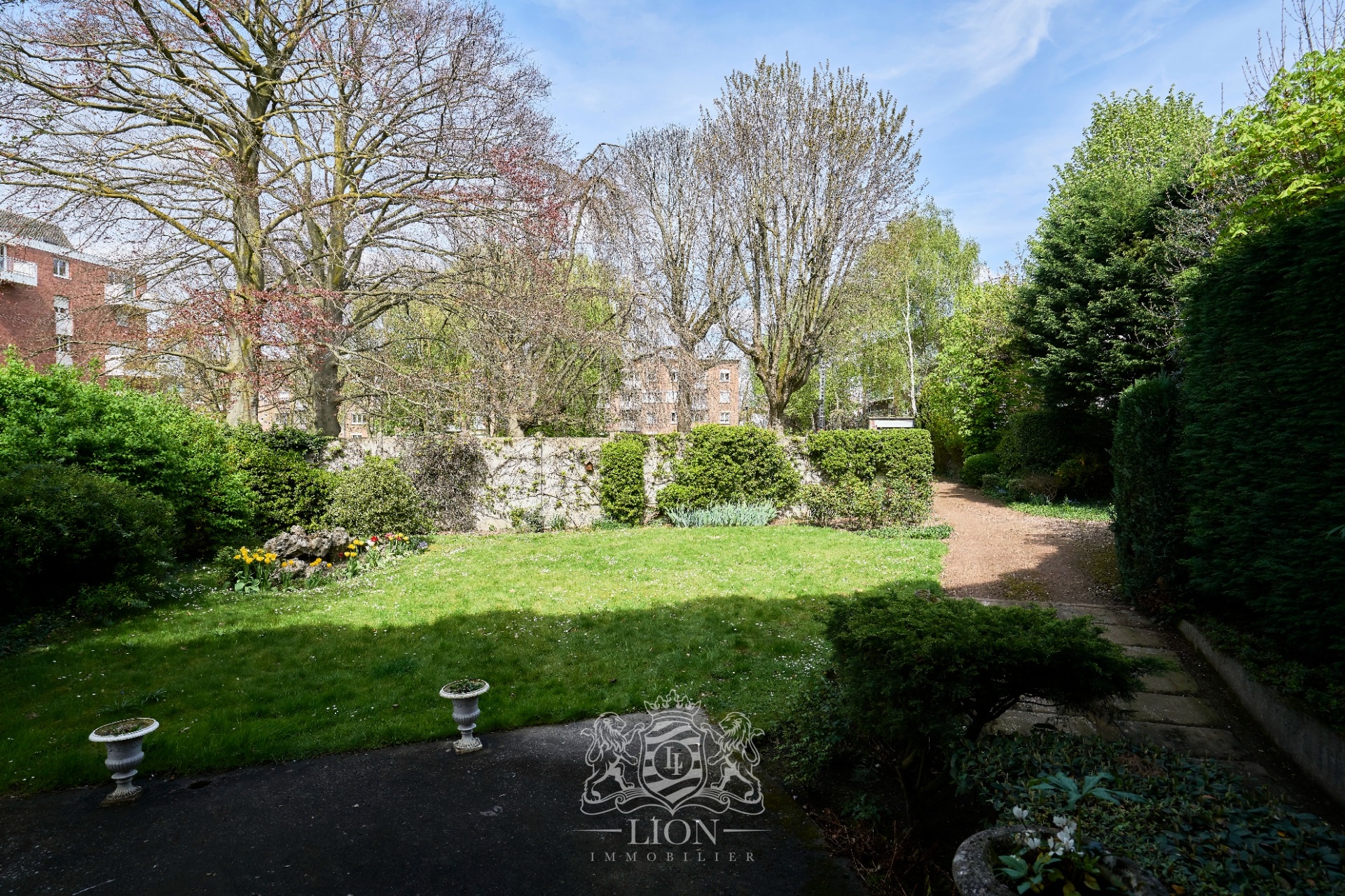 Maison semi individuelle avec jardin et garage Photo 2 - Le Lion Immobilier