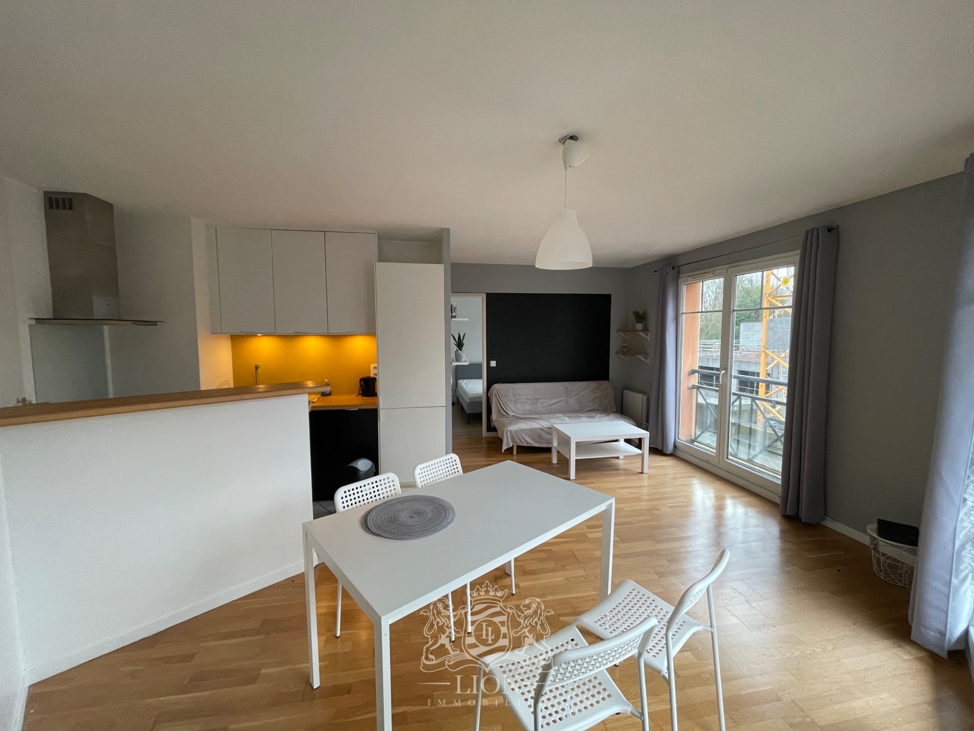 T2 avec balcon et garage Photo 1 - Le Lion Immobilier
