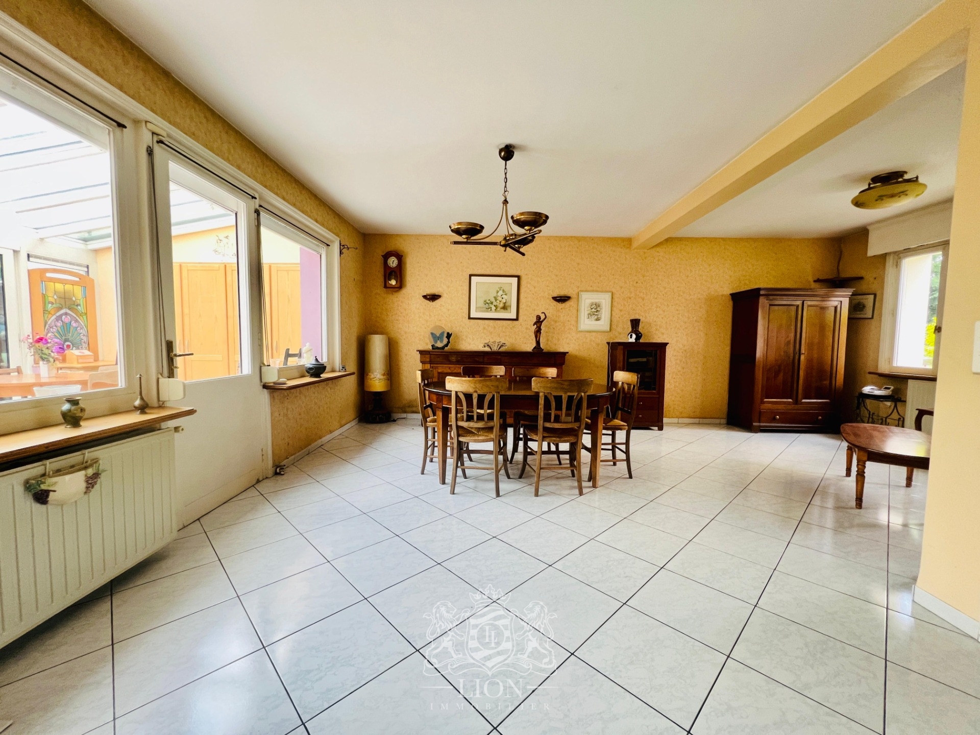 Grande maison semi individuelle avec garage Photo 3 - Le Lion Immobilier