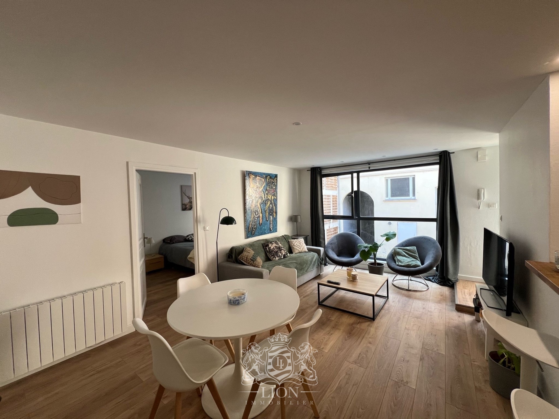 Appartement avec chambre et parking proche citadelle Photo 1 - Le Lion Immobilier