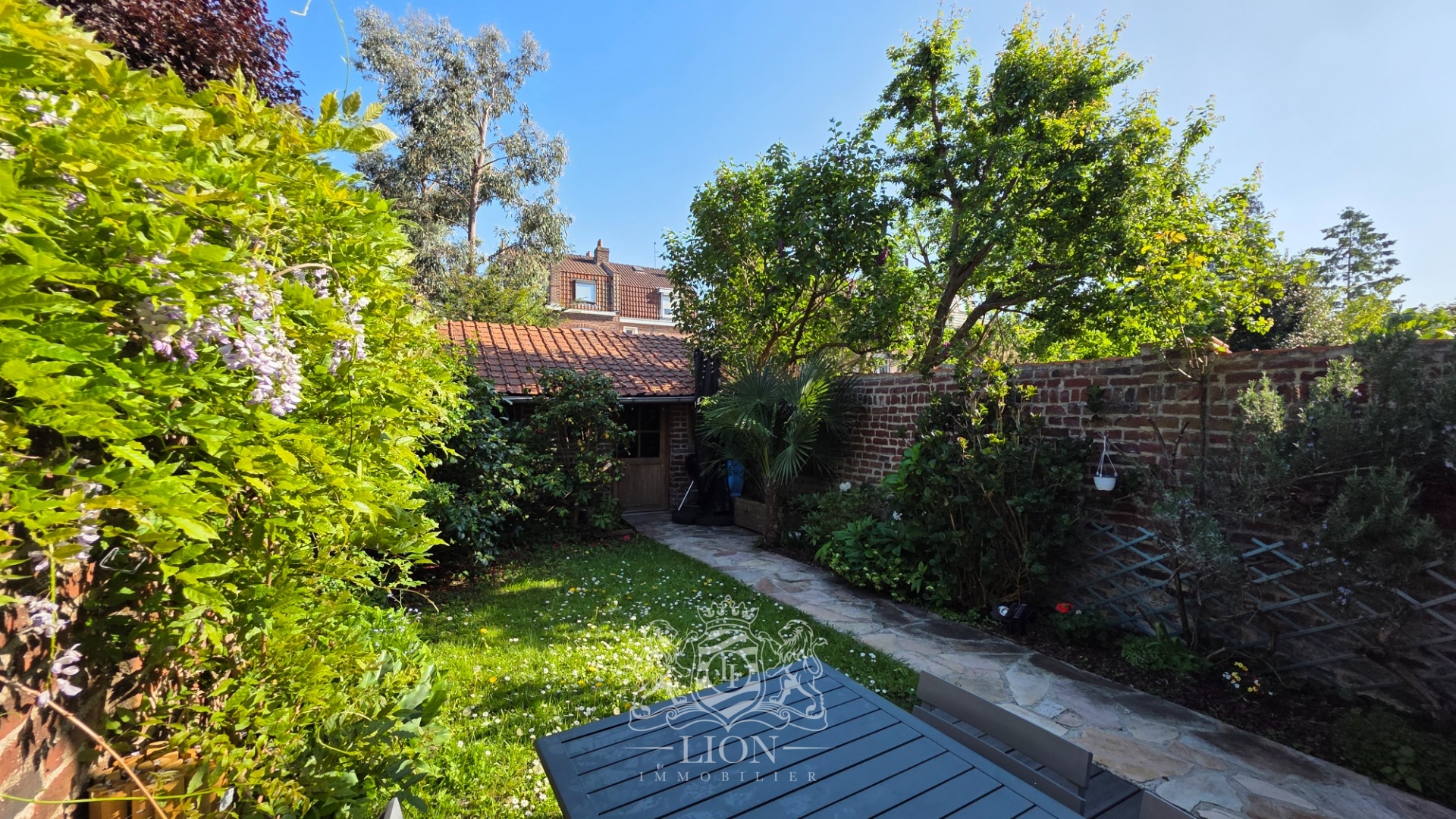 Coquette maison en impasse au canon d or Photo 1 - Le Lion Immobilier