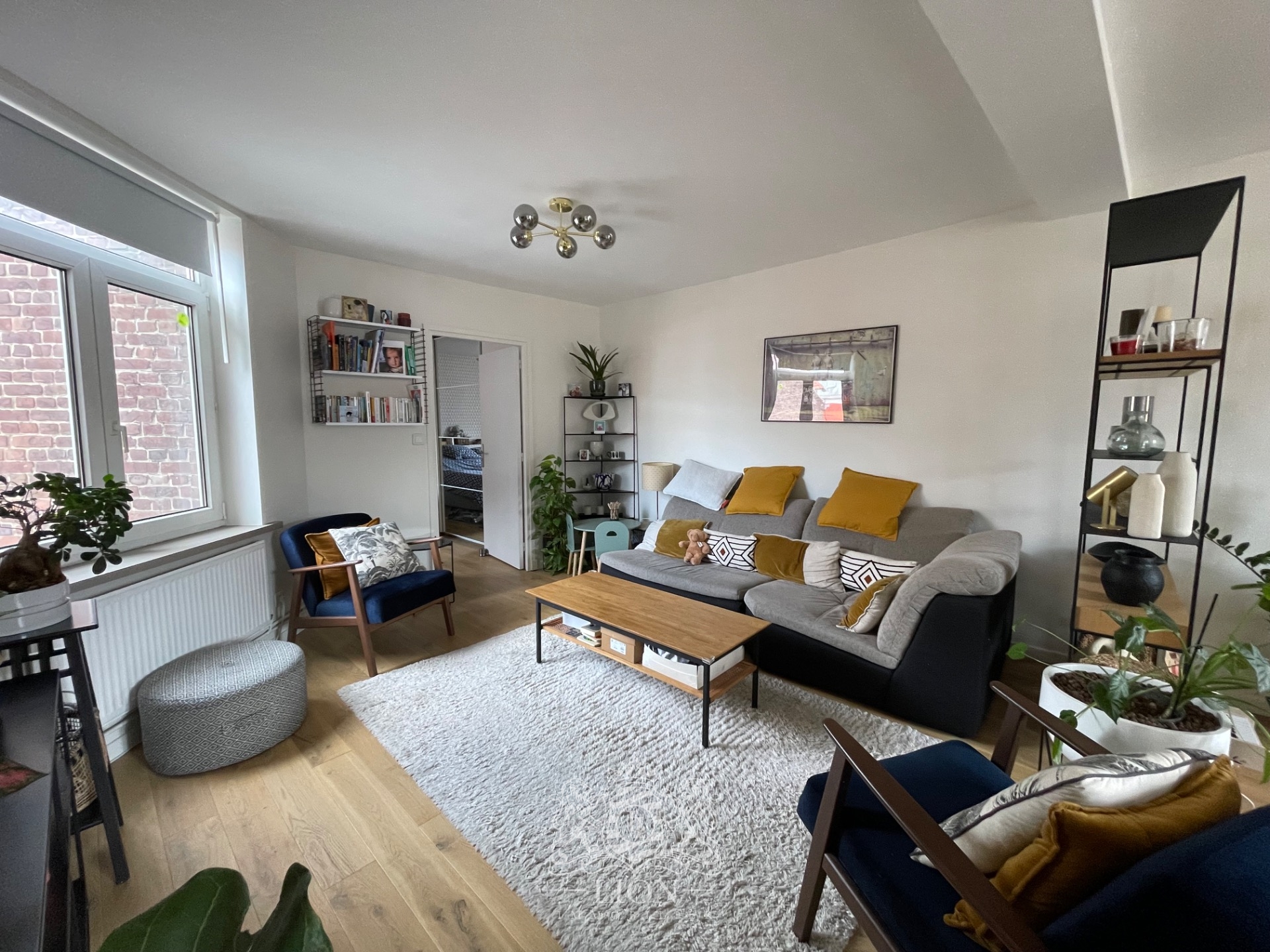 Appartement dernier etage lumineux Photo 1 - Le Lion Immobilier
