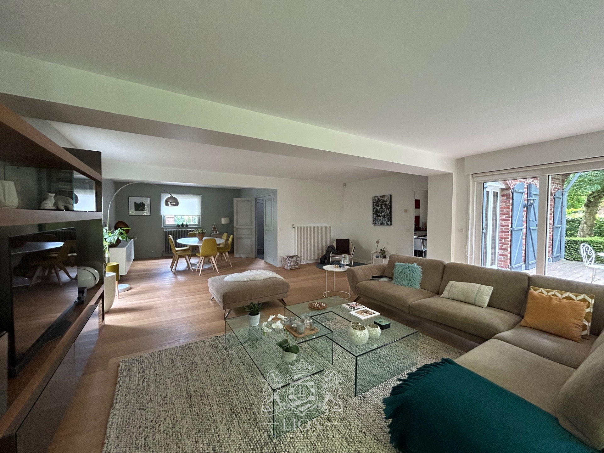 Belle maison individuelle avec grand jardin verdoyant Photo 2 - Le Lion Immobilier