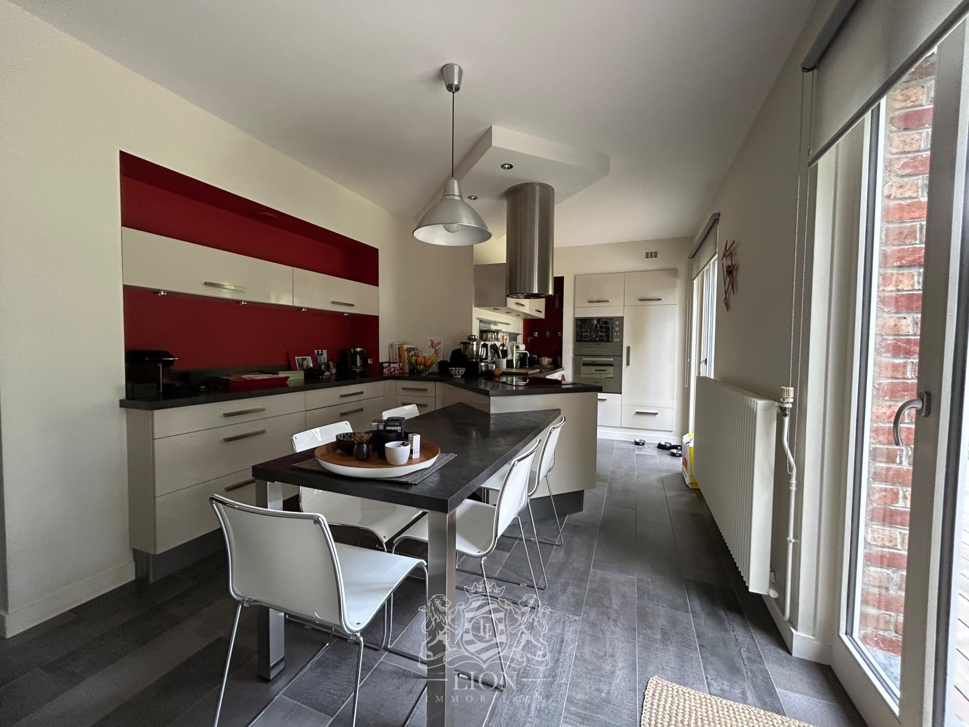 Belle maison individuelle avec grand jardin verdoyant Photo 4 - Le Lion Immobilier