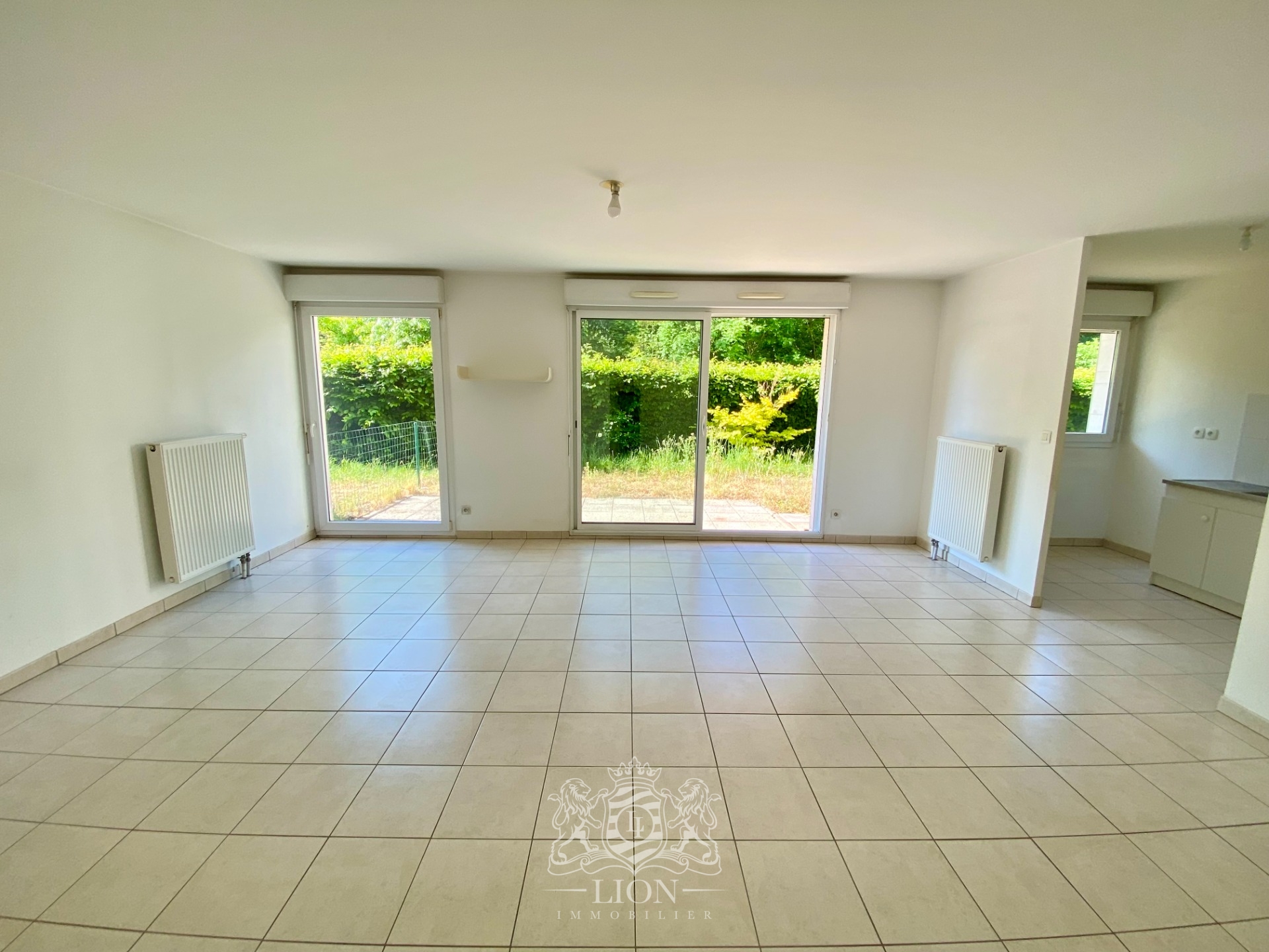 Rez de jardin deux chambres jardin et parking  Photo 3 - Le Lion Immobilier