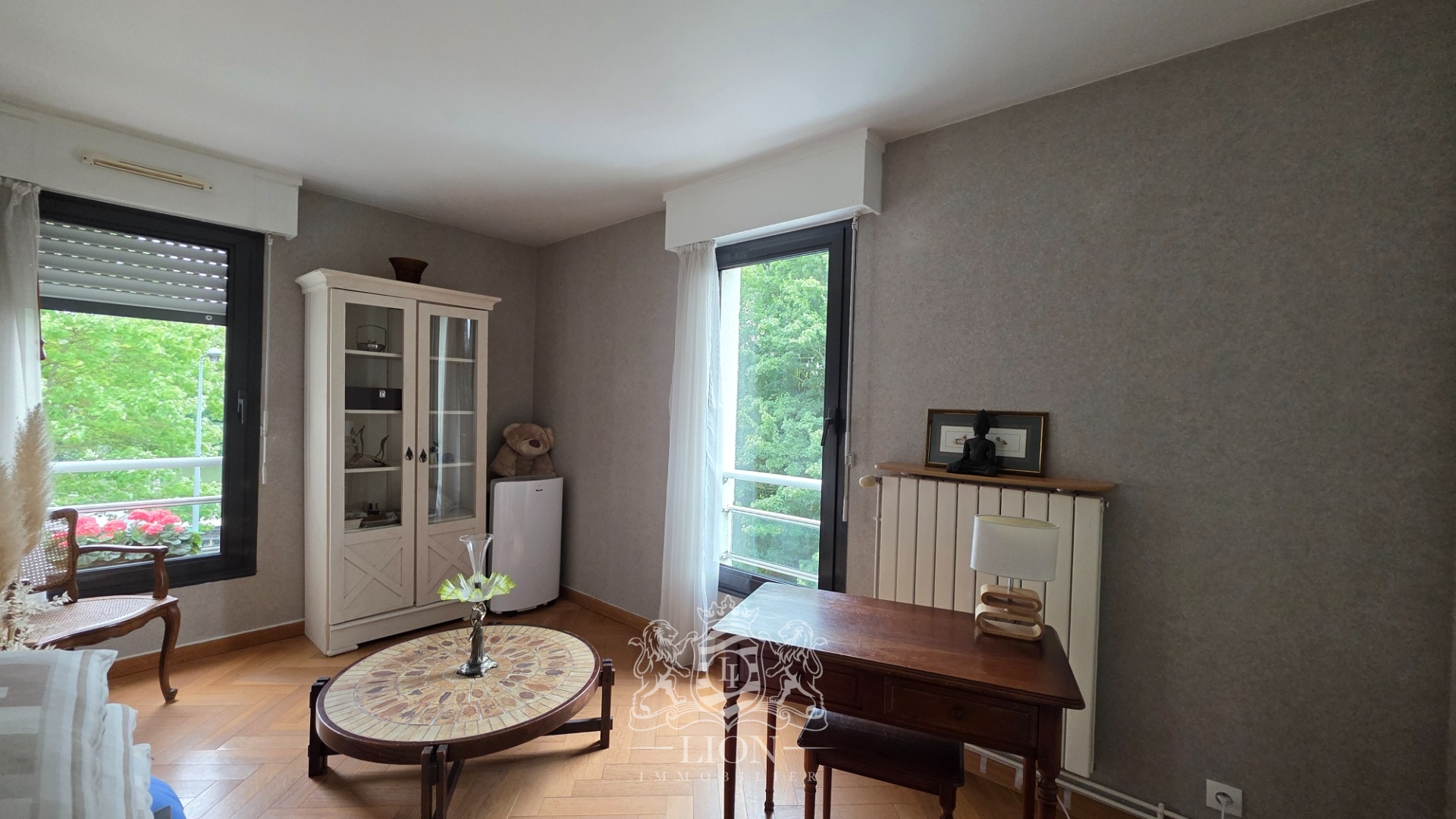 Grand t4 en bord de deule avec terrasse et garage Photo 6 - Le Lion Immobilier