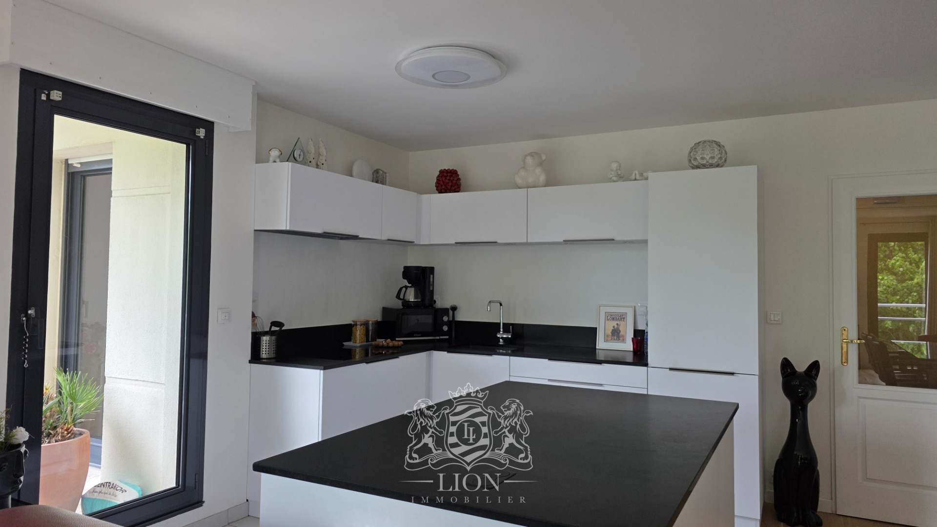 Grand t4 en bord de deule avec terrasse et garage Photo 8 - Le Lion Immobilier