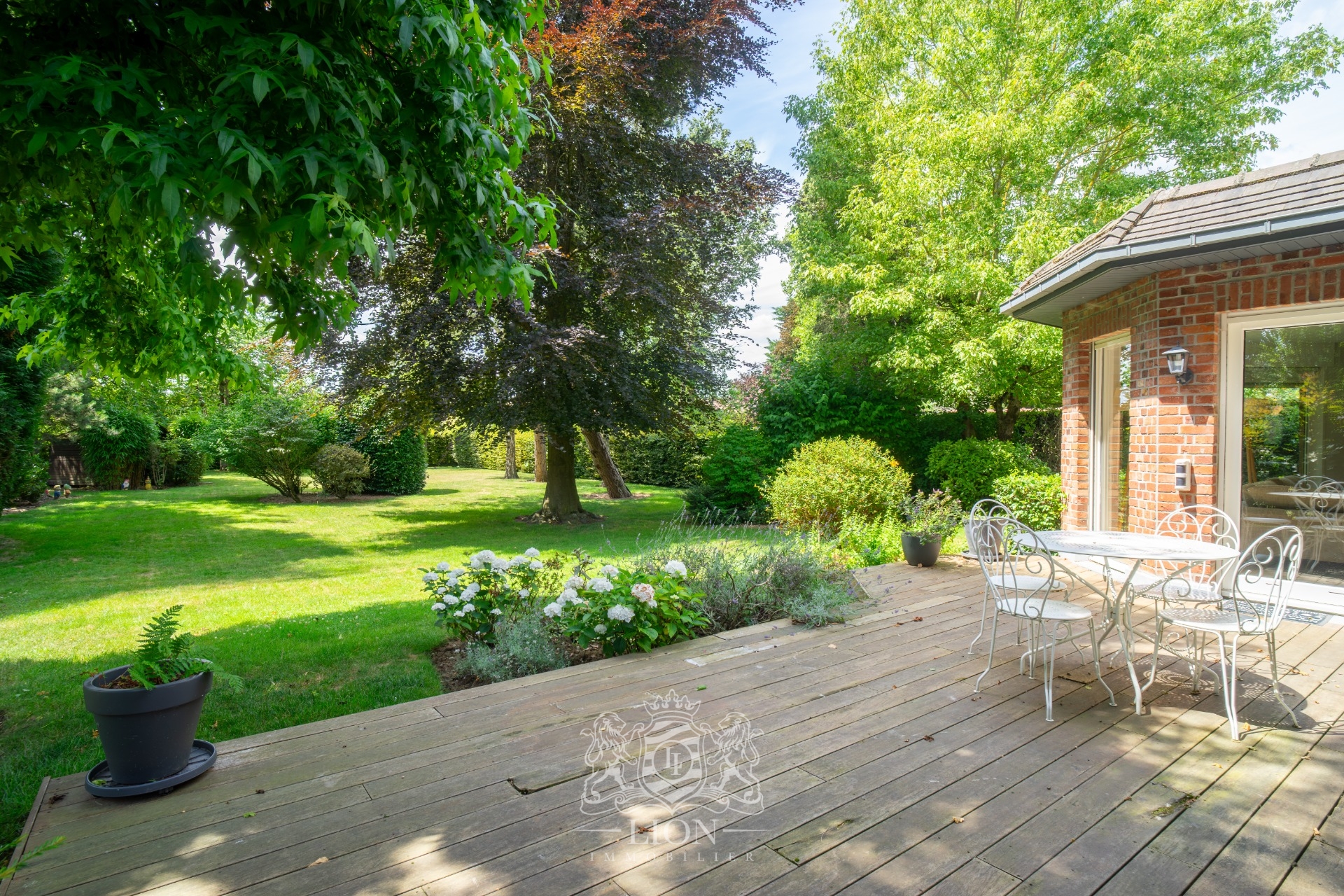 En campagne maison individuelle avec grand jardin verdoyant Photo 3 - Le Lion Immobilier