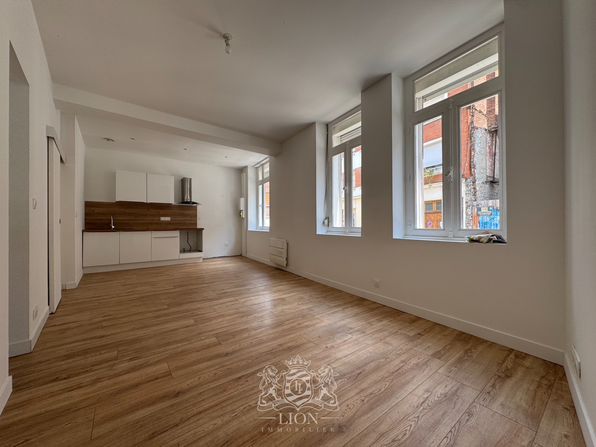 Appartement rez de chaussee  en duplex 3 pieces Photo 1 - Le Lion Immobilier