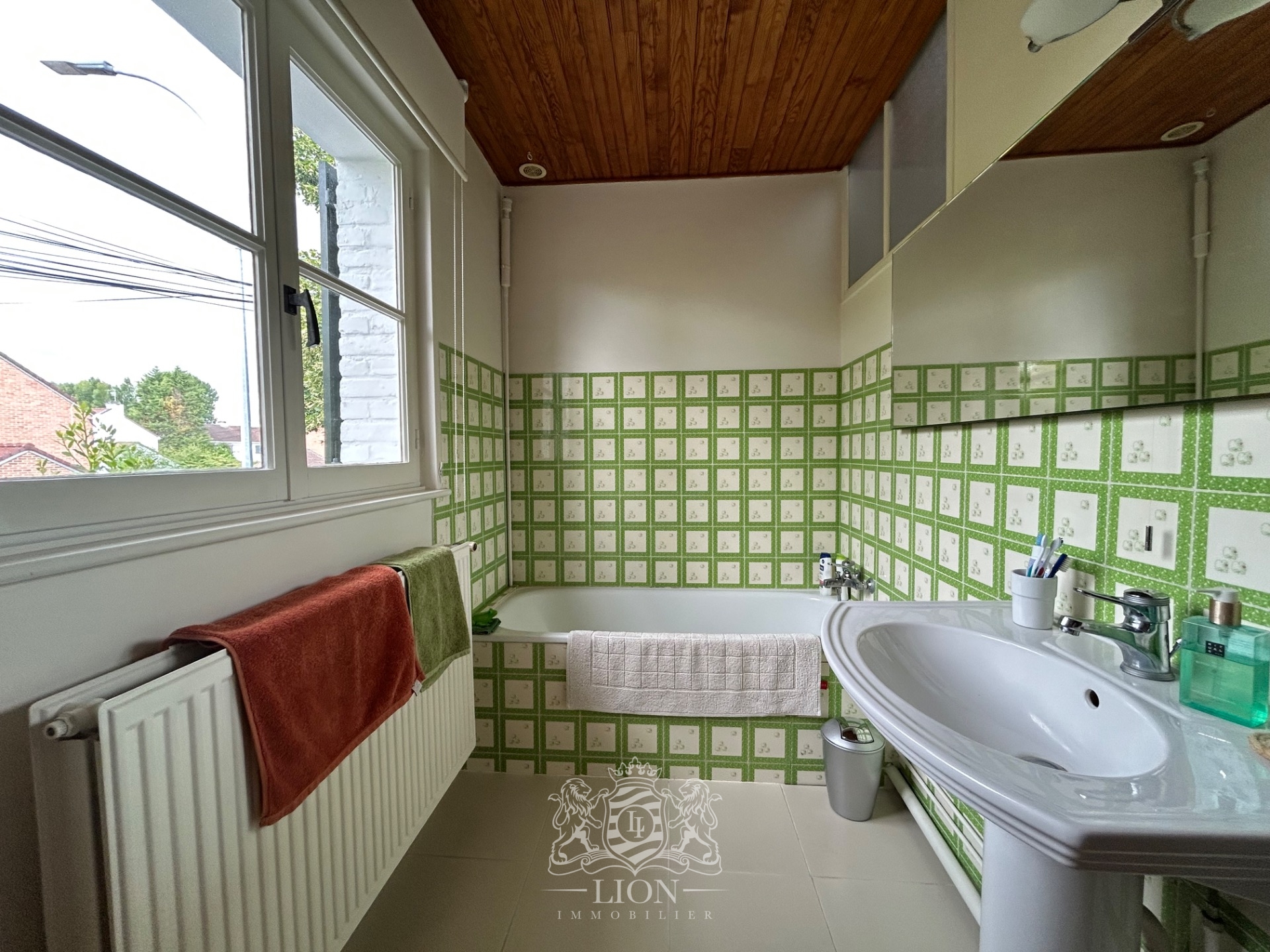 Jolie maison semi individuelle avec garage Photo 9 - Le Lion Immobilier