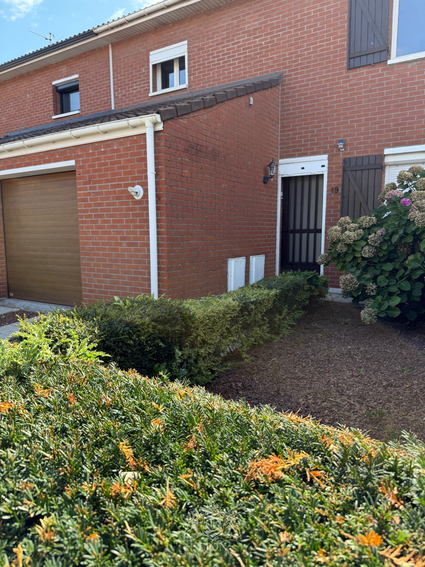 Maison secteur top trois chambres mitoyenne par le garage  Photo 1 - Le Lion Immobilier