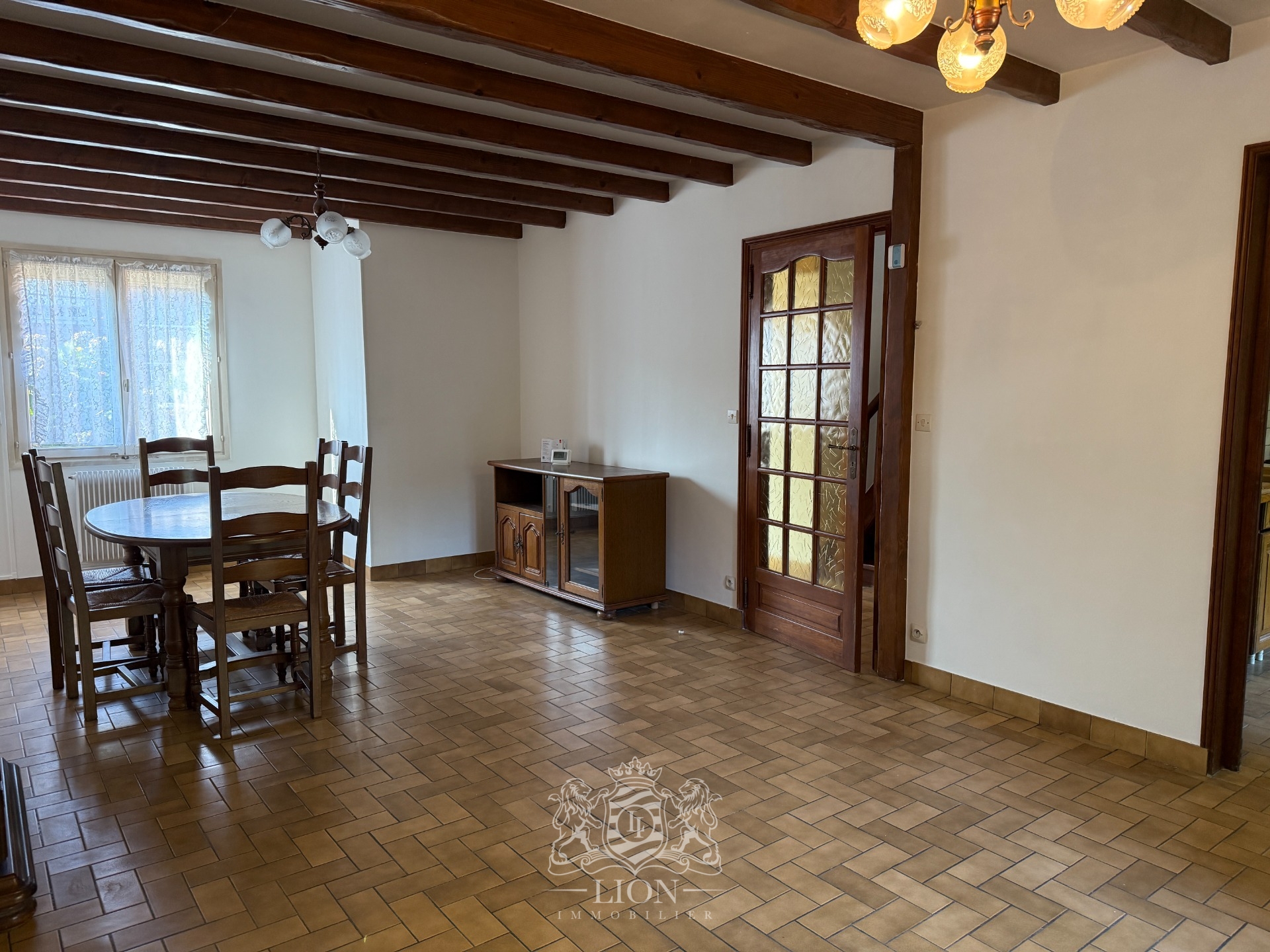 Maison secteur top trois chambres mitoyenne par le garage  Photo 2 - Le Lion Immobilier