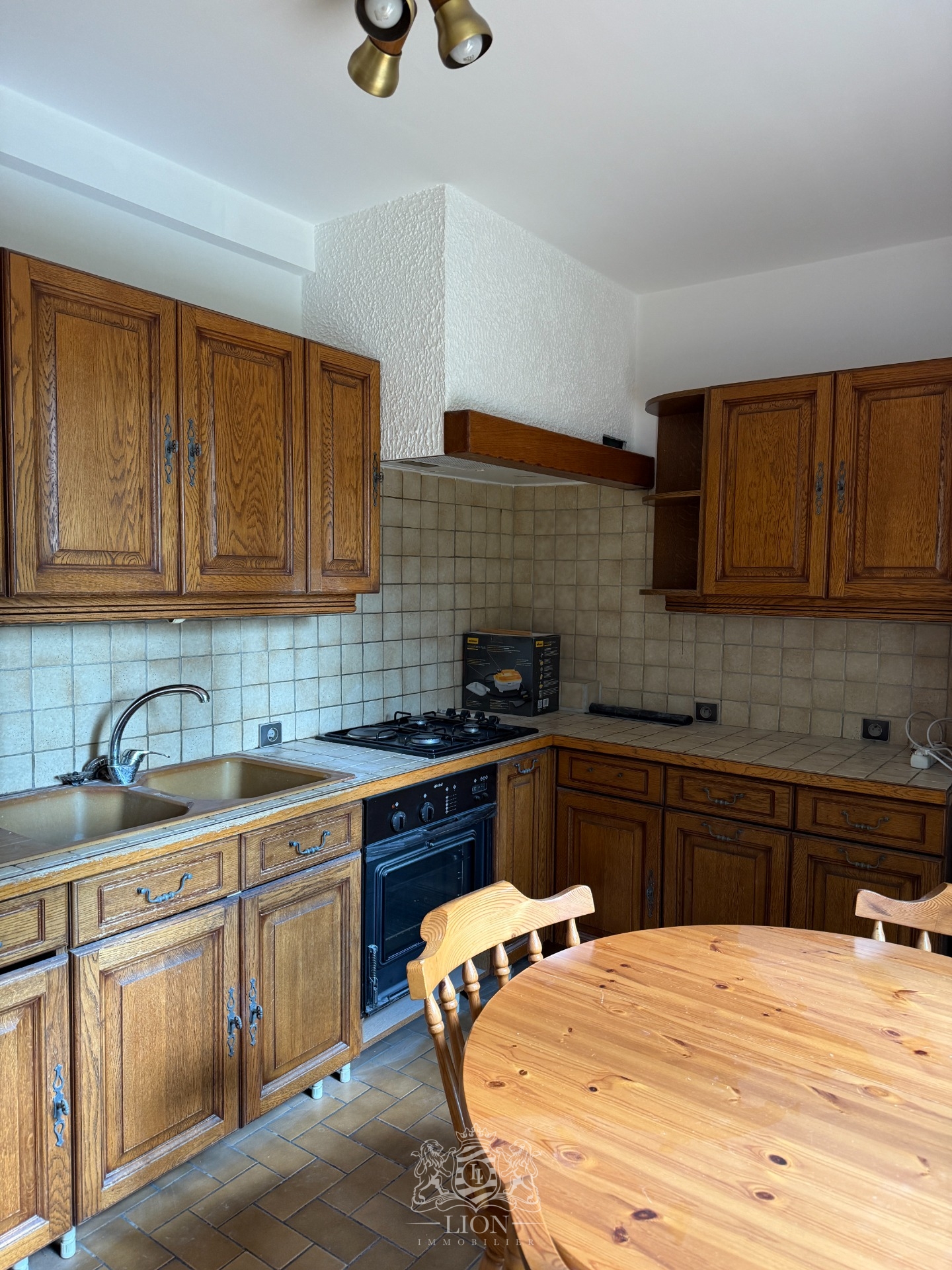 Maison secteur top trois chambres mitoyenne par le garage  Photo 4 - Le Lion Immobilier