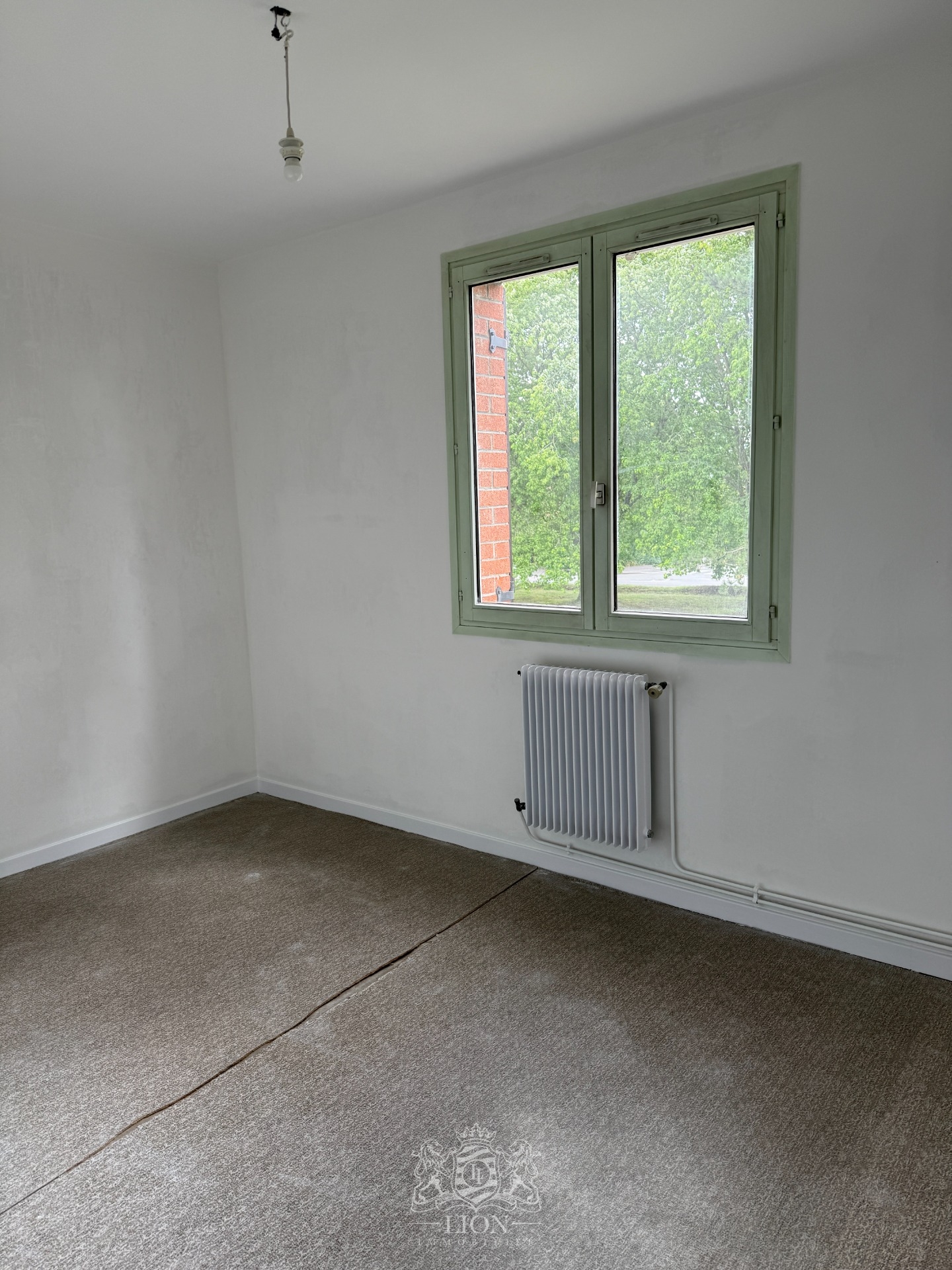 Maison secteur top trois chambres mitoyenne par le garage  Photo 6 - Le Lion Immobilier