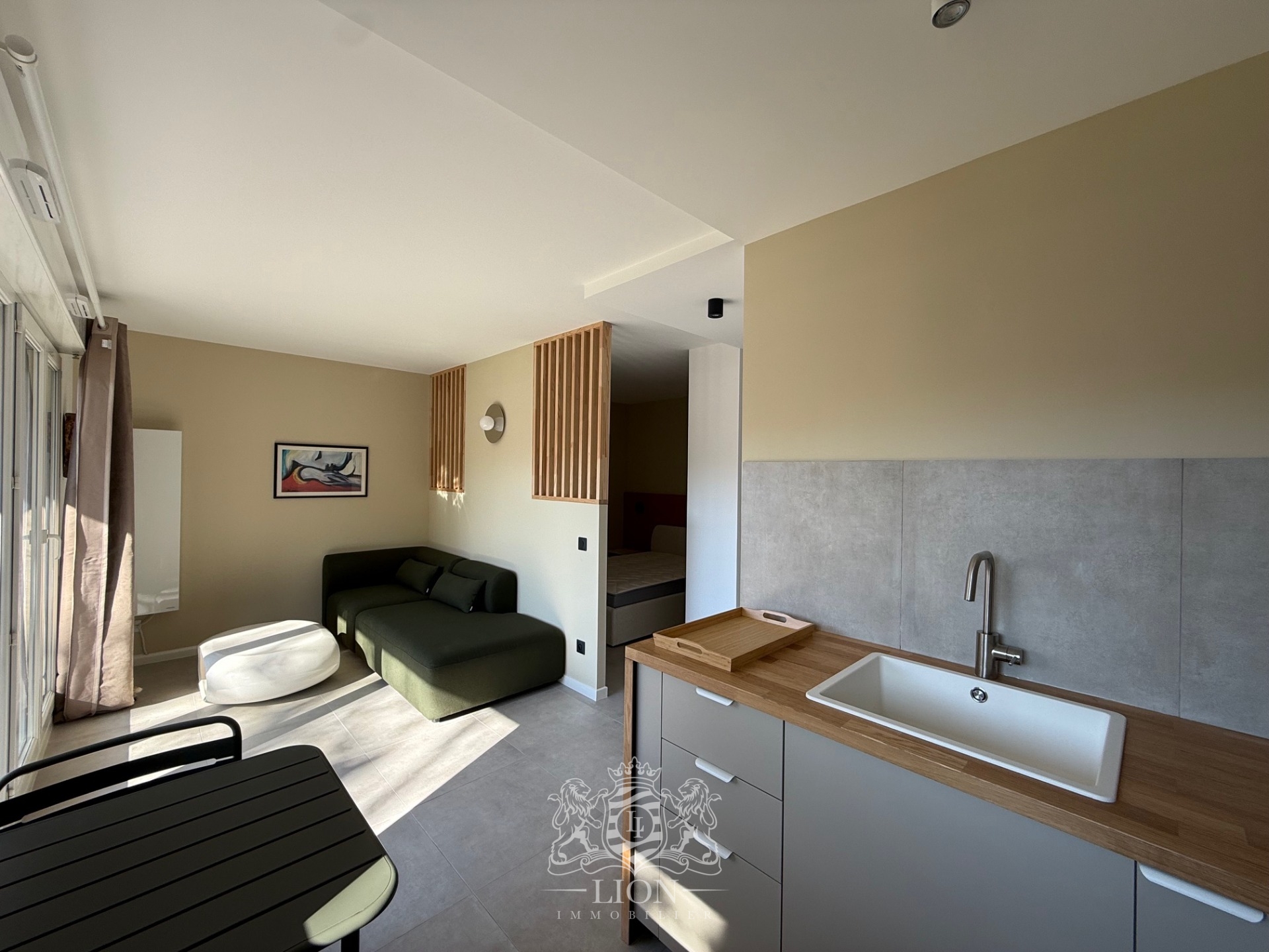 Aqtk vieux lille t1 bis meuble avec terrasse et parking Photo 1 - Le Lion Immobilier