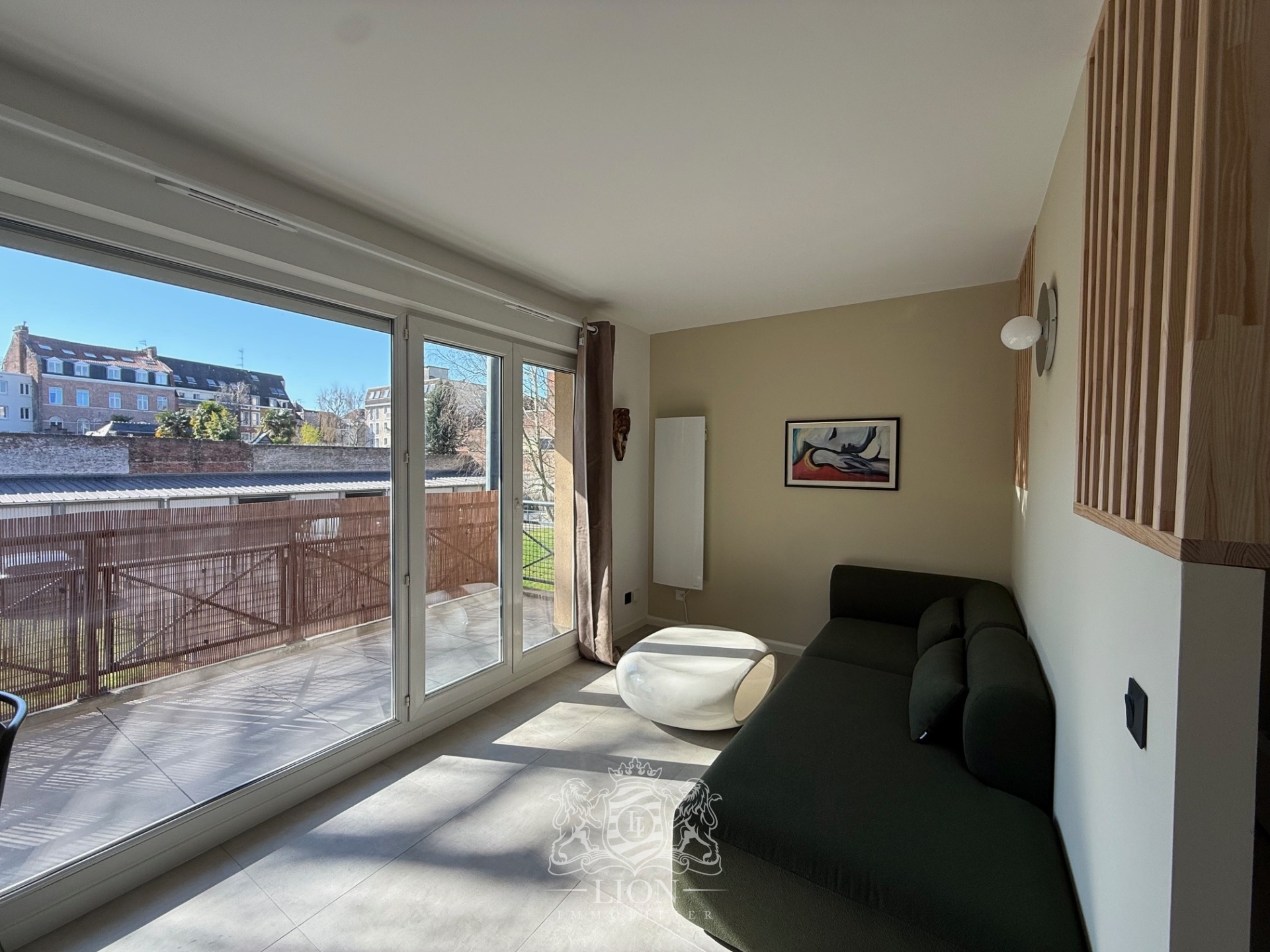 Aqtk vieux lille t1 bis meuble avec terrasse et parking Photo 4 - Le Lion Immobilier