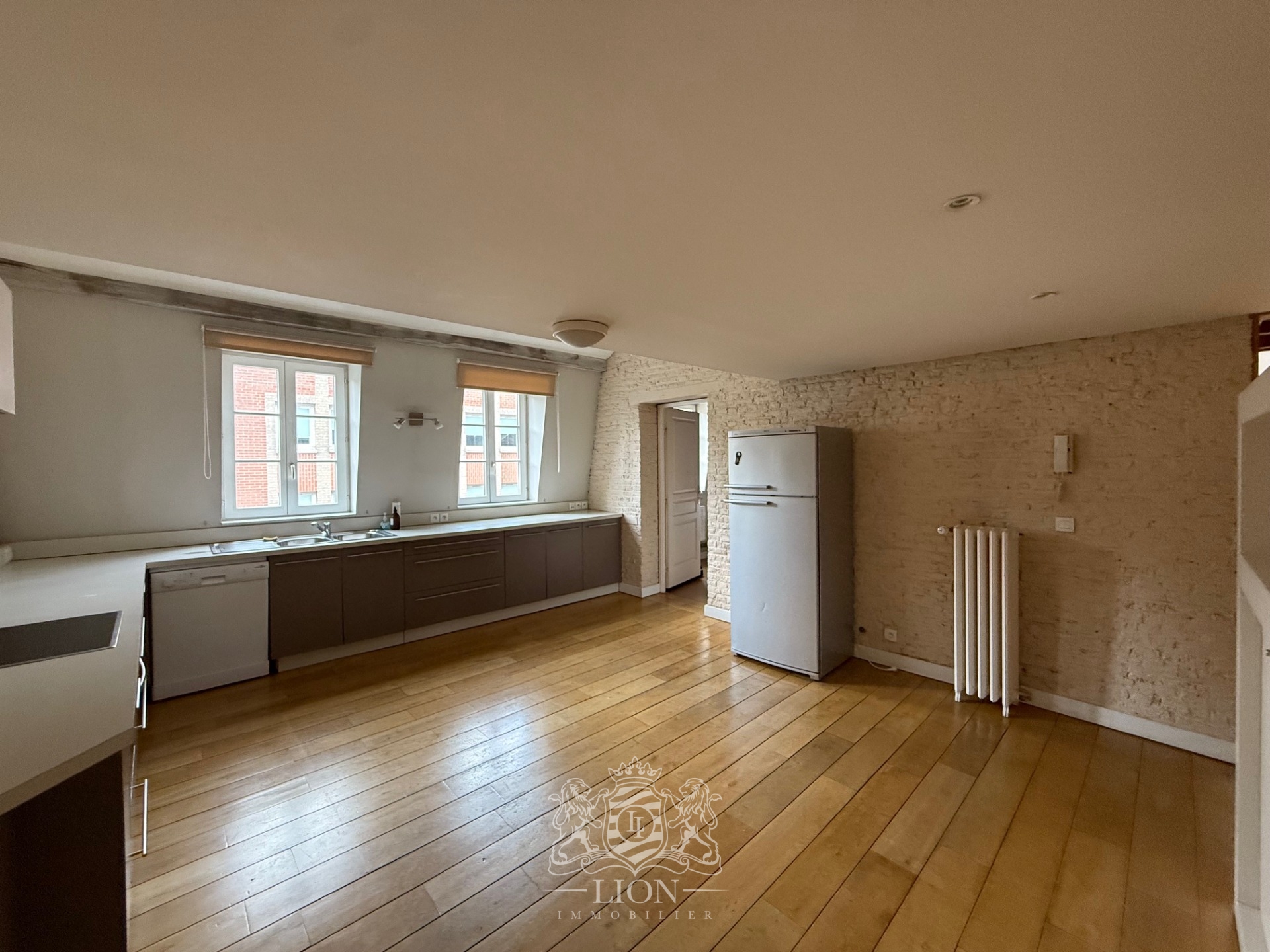 Aqvw vieux lille type 5 en duplex avec parking Photo 11 - Le Lion Immobilier